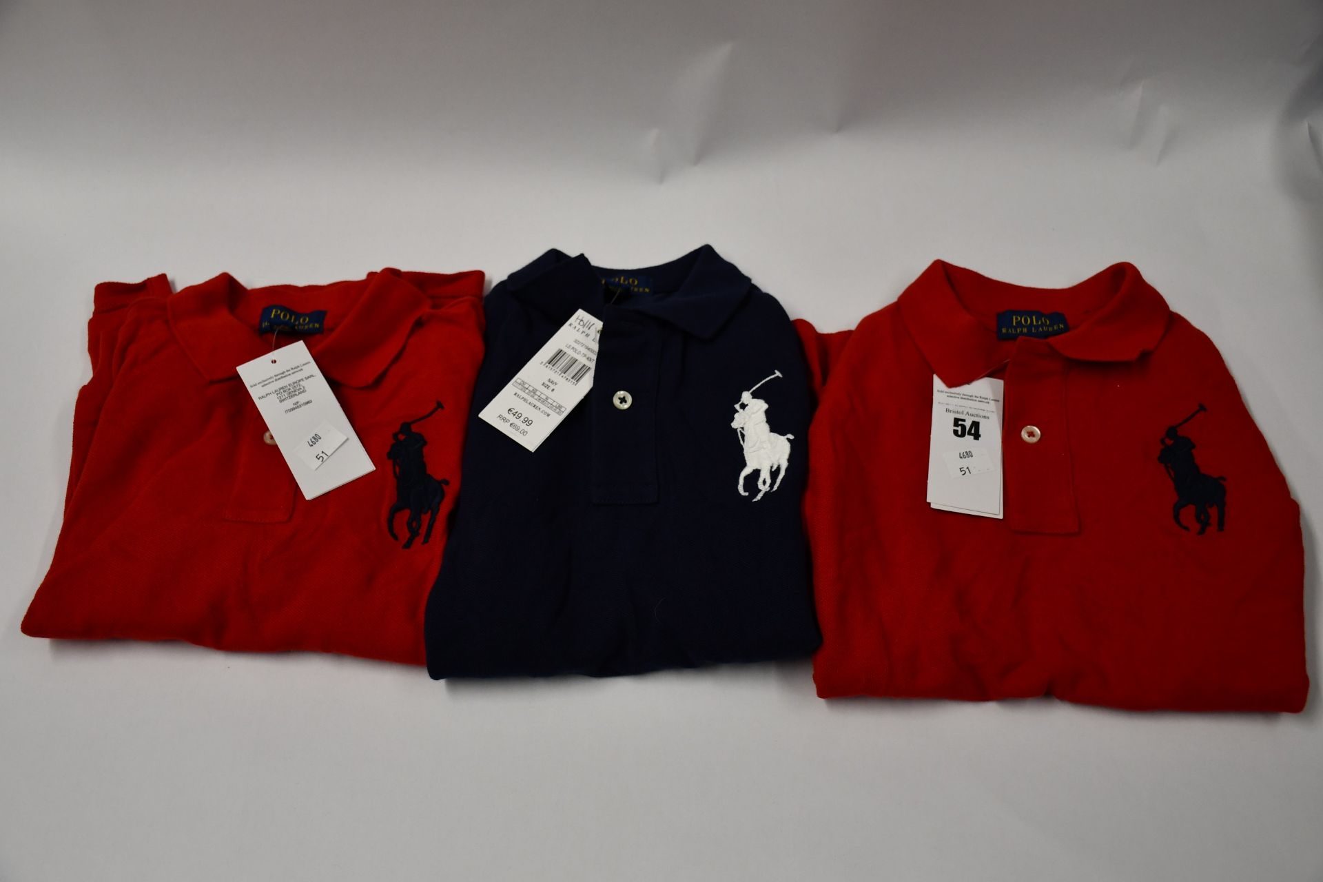 Two as new Ralph Lauren red children's long sleeved polo tops (Size 6) and one as new children's