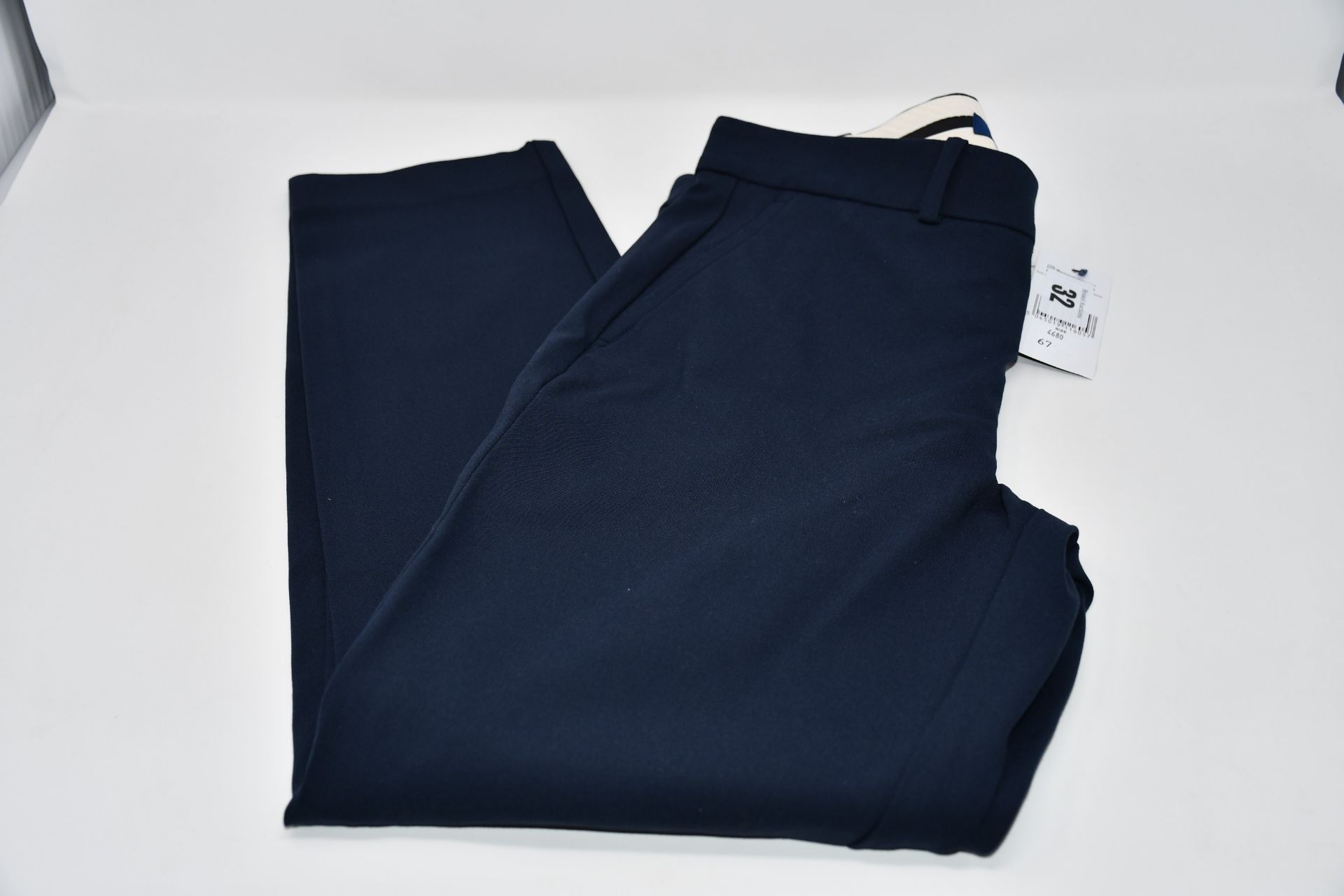 A pair of as new Ralph Lauren navy straight leg trousers (Size 4).