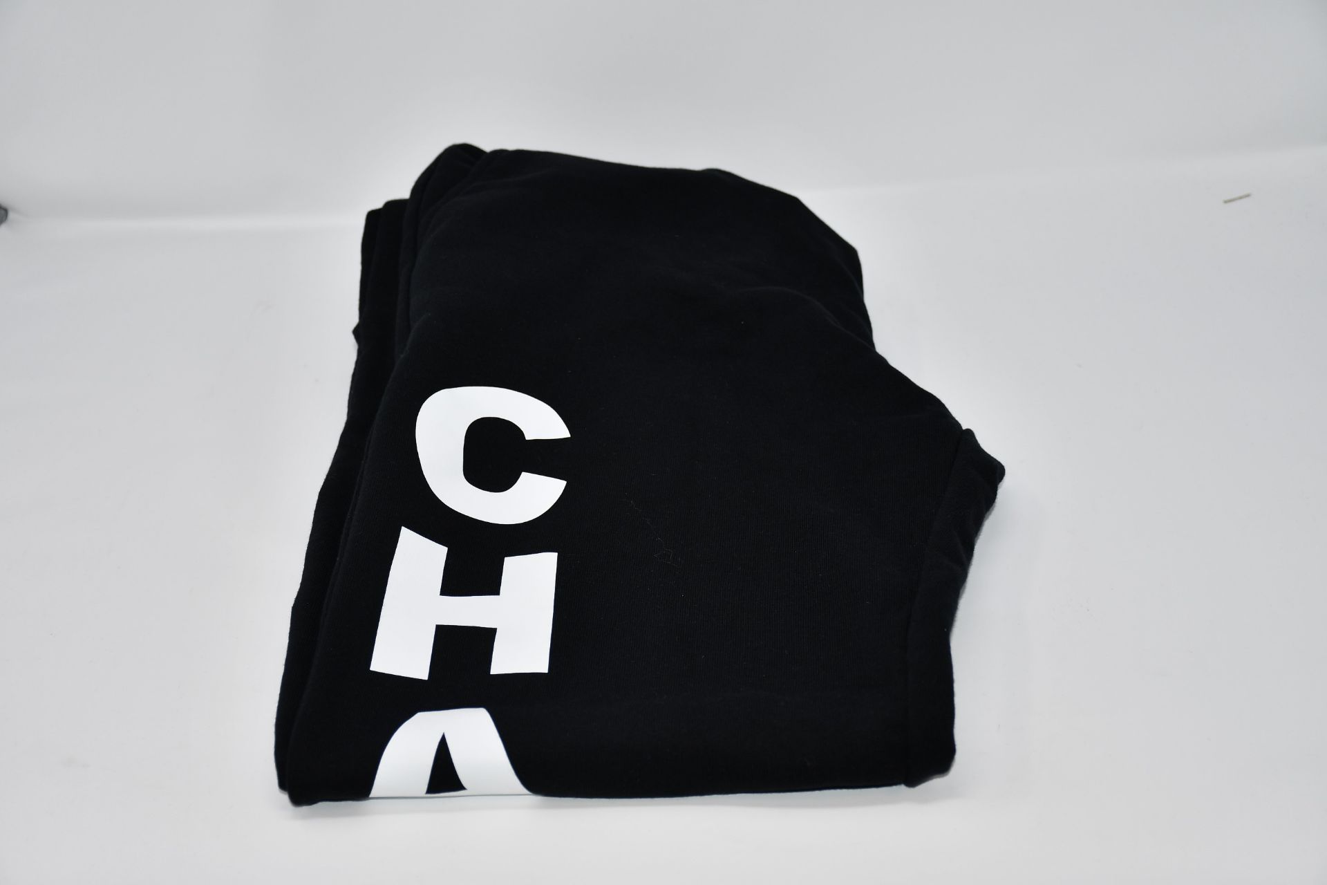 An as new Chaos Pill T-shirt (S) and Chaos sweatpants (S).