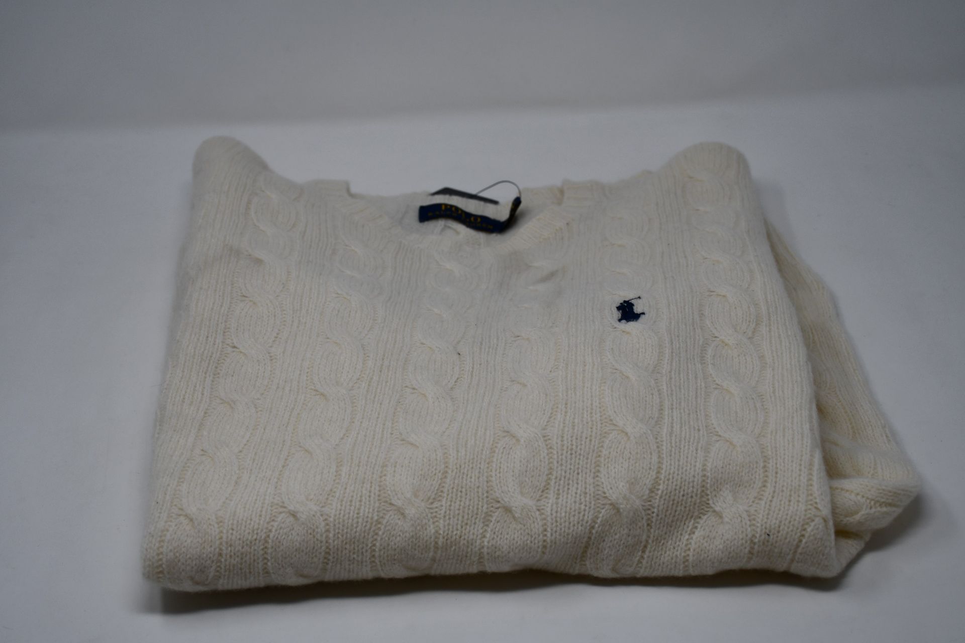 An as new Ralph Lauren cable cashmere cream jumper (M).