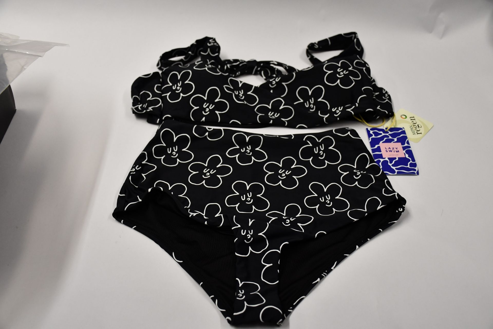 A quantity of as new Lazy Oaf Wallflower Wrap bikini tops in black and white (Size 10) and