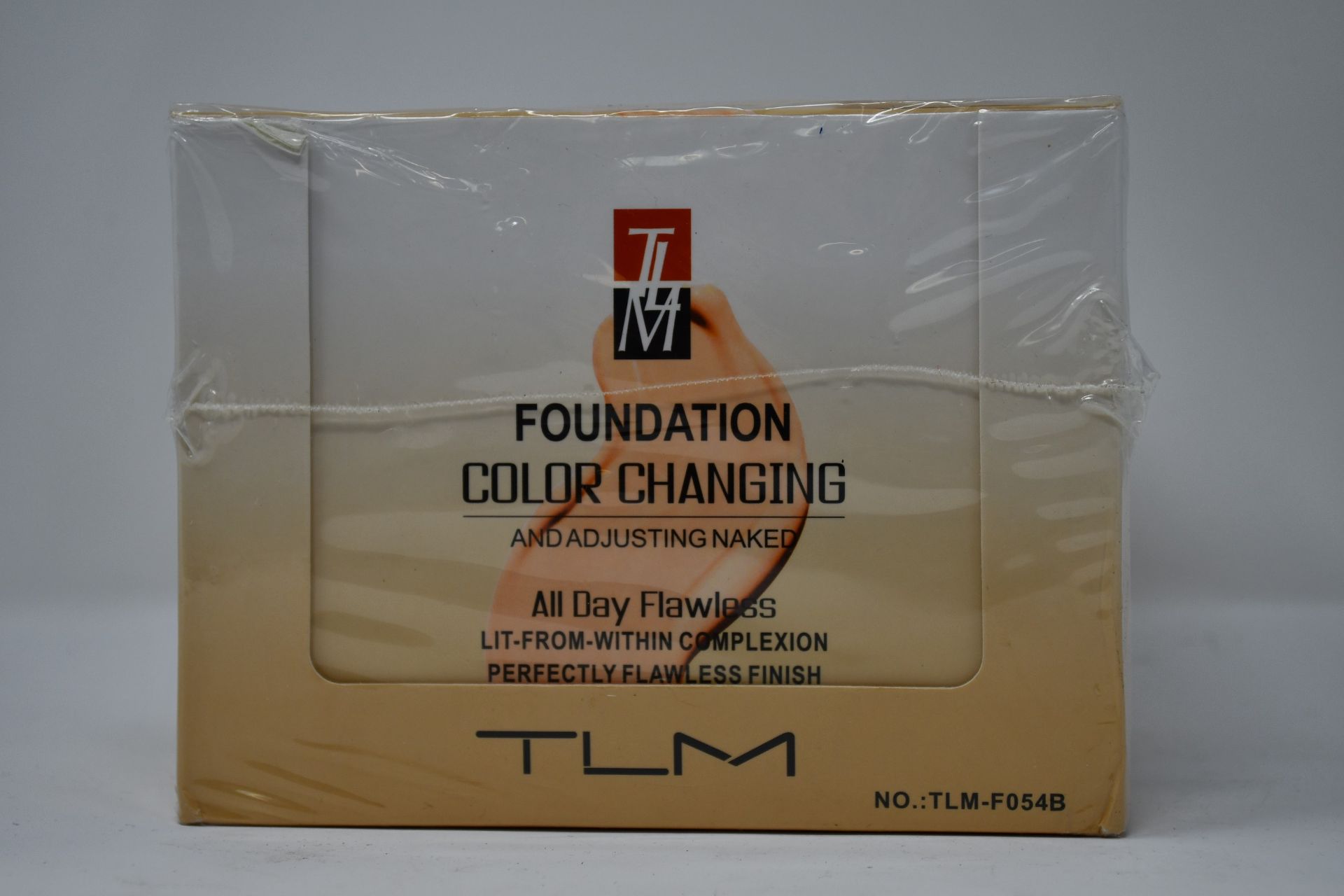 Twelve boxed as new TLM Colour Changing Foundation 30ml (TLM-F054B).