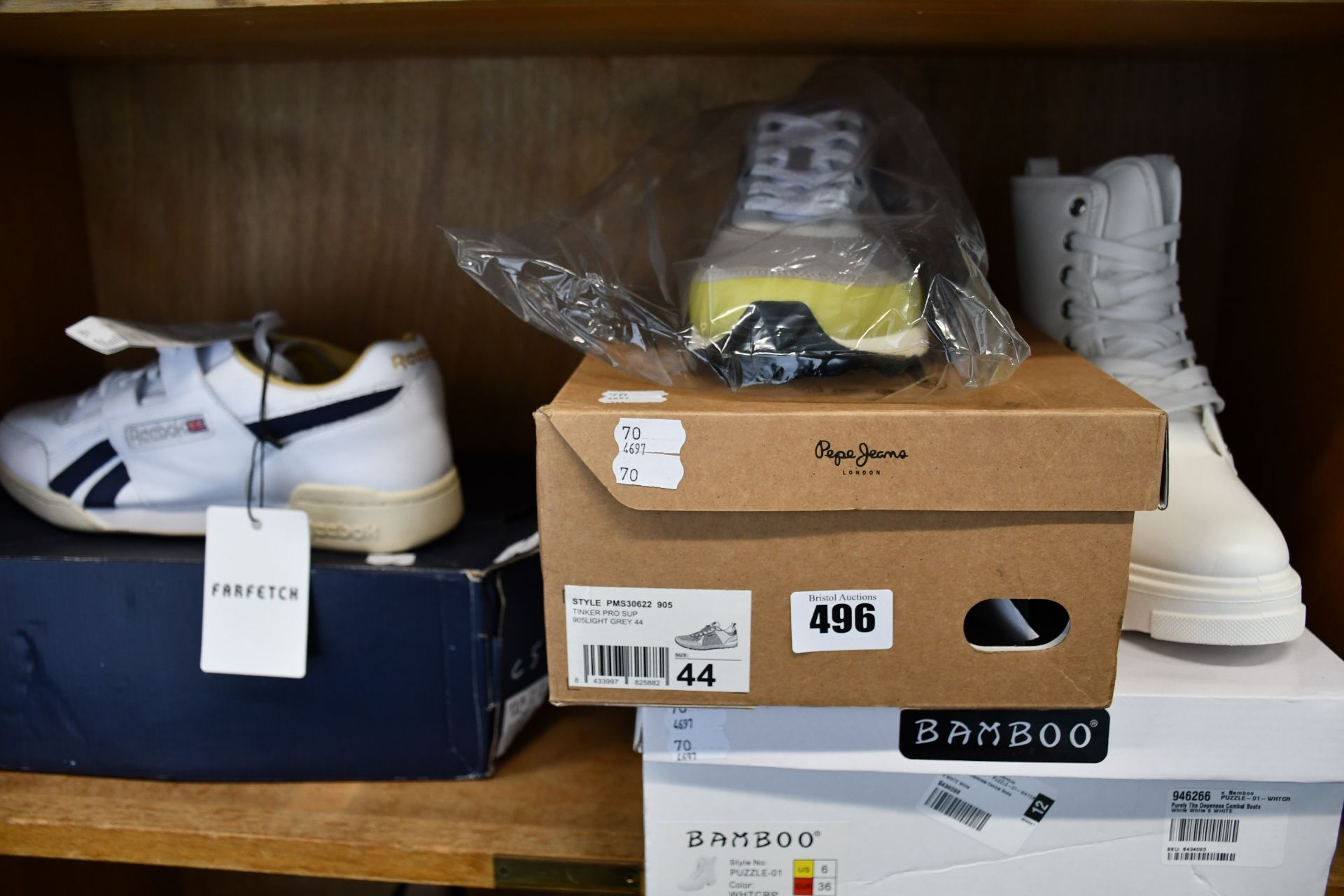 A pair of Pepe Jeans Tinker Pro Sup trainers (Size 44?), a pair men's of Reebok Workout Plus