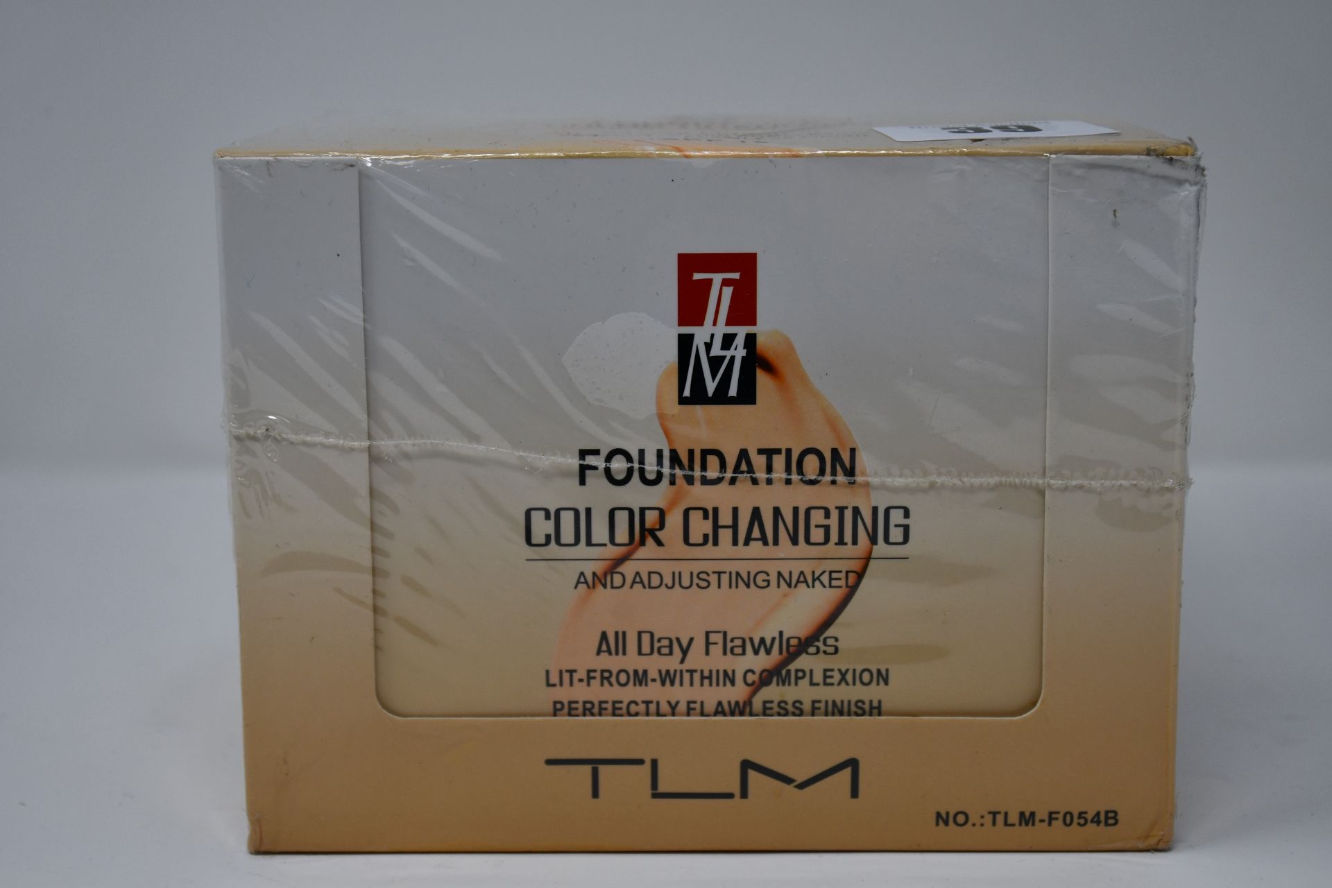 Twelve boxed as new TLM Colour Changing Foundation 30ml (TLM-F054B).