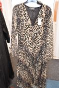 An as new The Kooples contemporary leopard dress (Size 1 - RRP £278 - no tag).