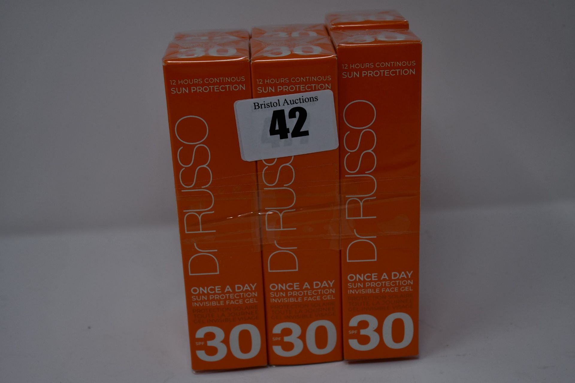 Six as new Dr Russo Once A Day sun protection invisible face gels SPF 30 (30ml).