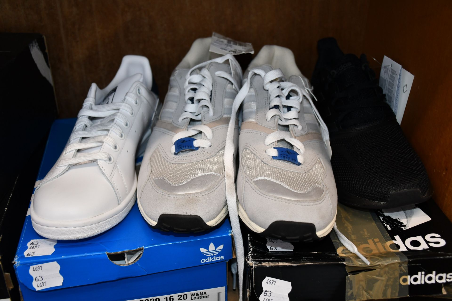 A pair of Adidas Stan Smith trainers (UK 6), a pair of Adidas Runfalcon trainers (UK 5.5) and a pair