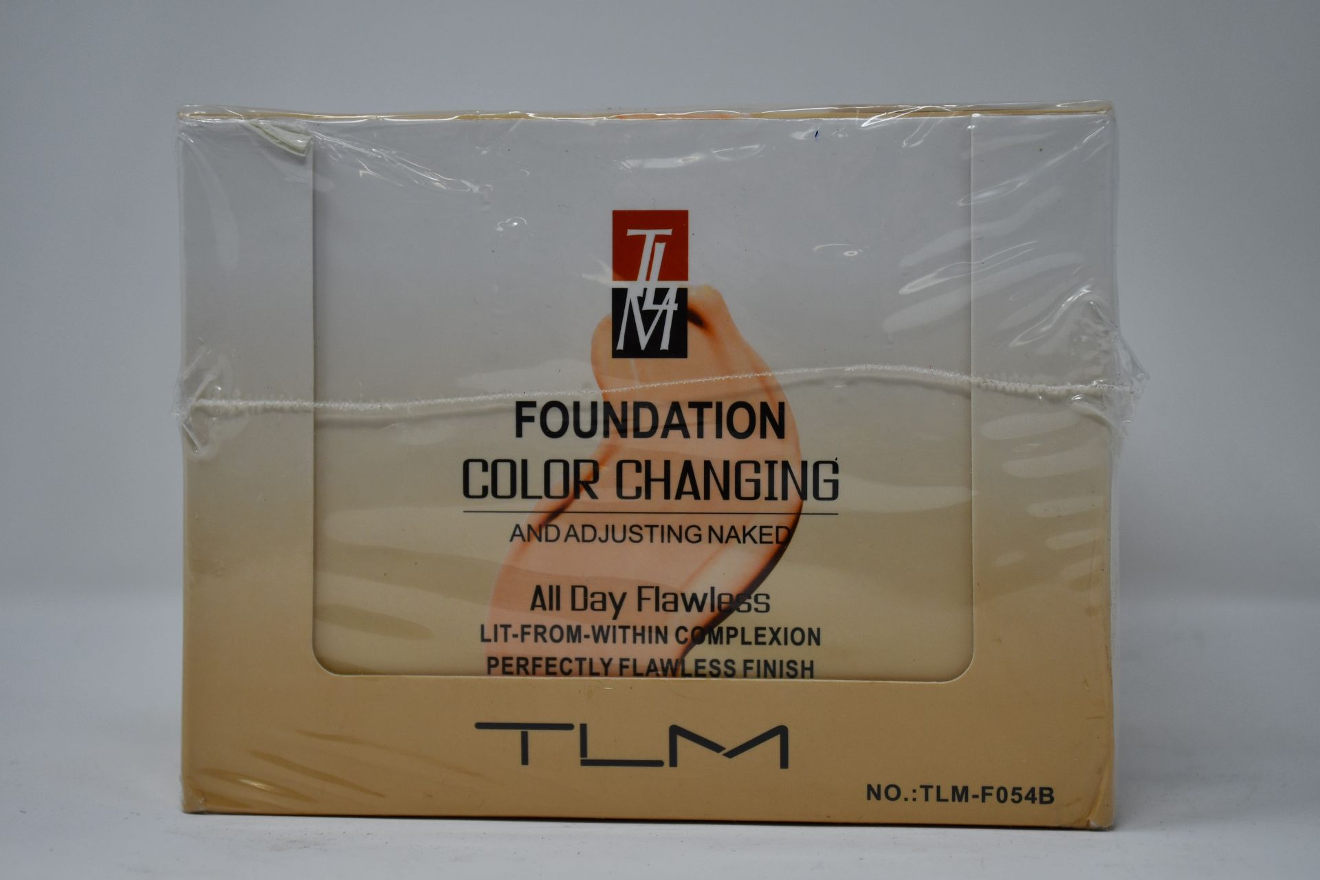 Twelve boxed as new TLM Colour Changing Foundation 30ml (TLM-F054B).