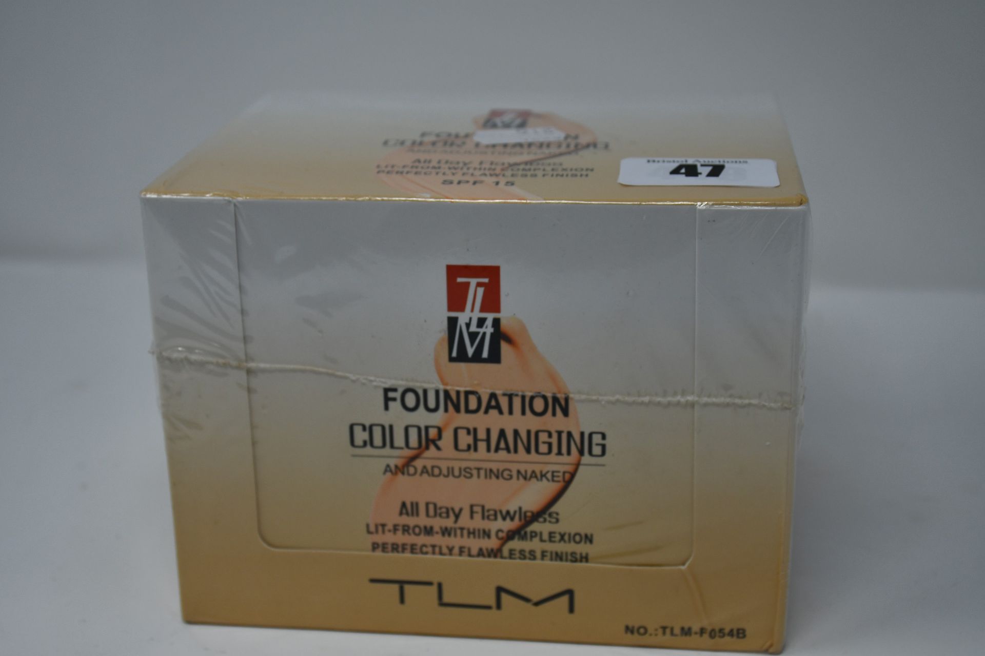 Twelve boxed as new TLM Colour Changing Foundation 30ml (TLM-F054B).