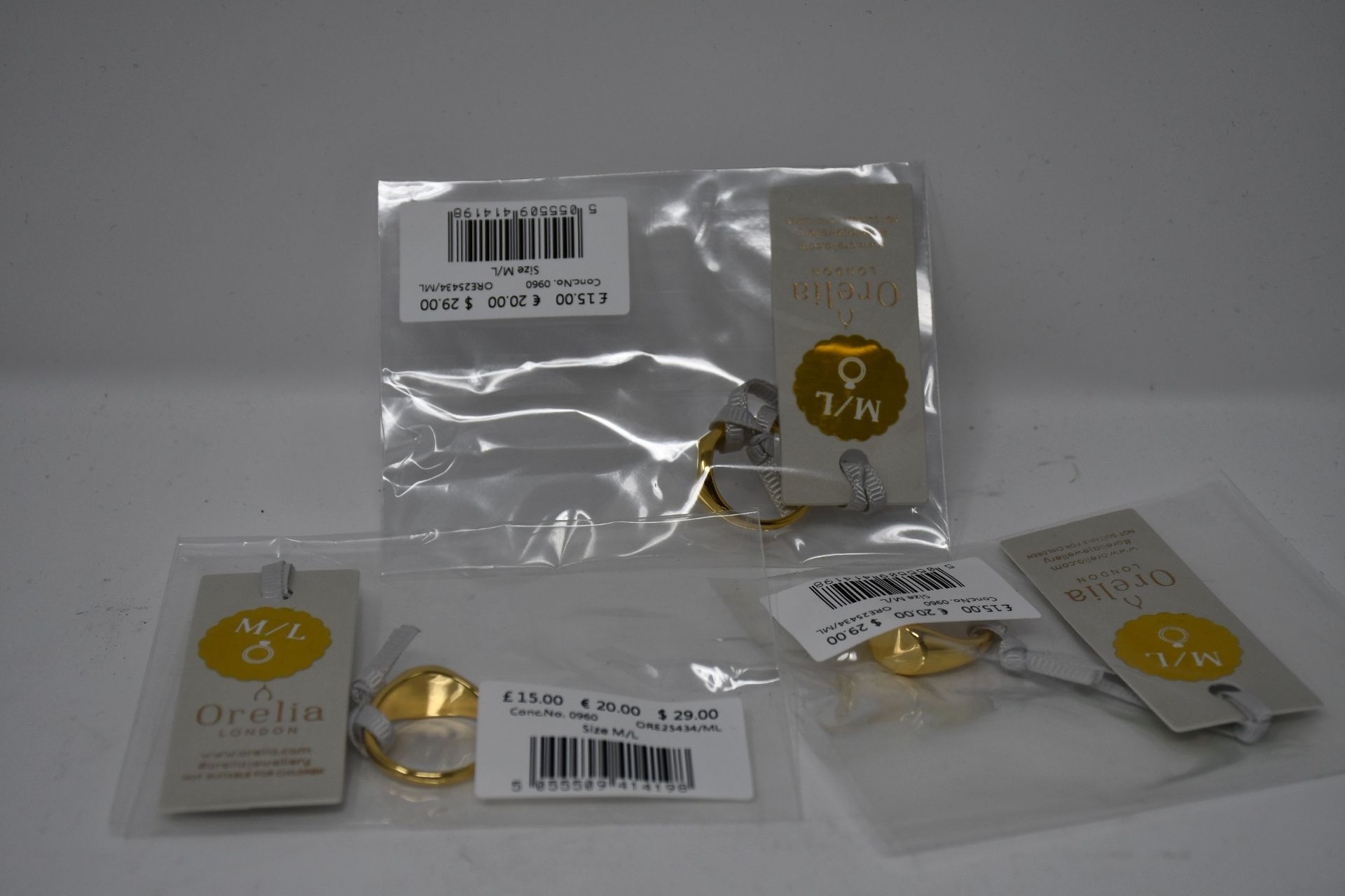 A quantity of Orelia London clean metal oval signet rings M/L (Approximately 50).