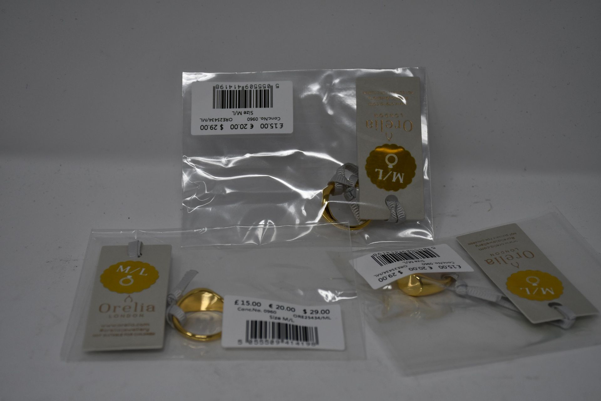 A quantity of Orelia London clean metal oval signet rings M/L (Approximately 50).