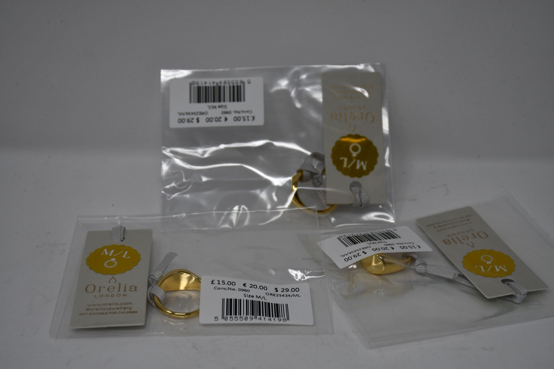 A quantity of Orelia London clean metal oval signet rings S/M (Approximately 50).