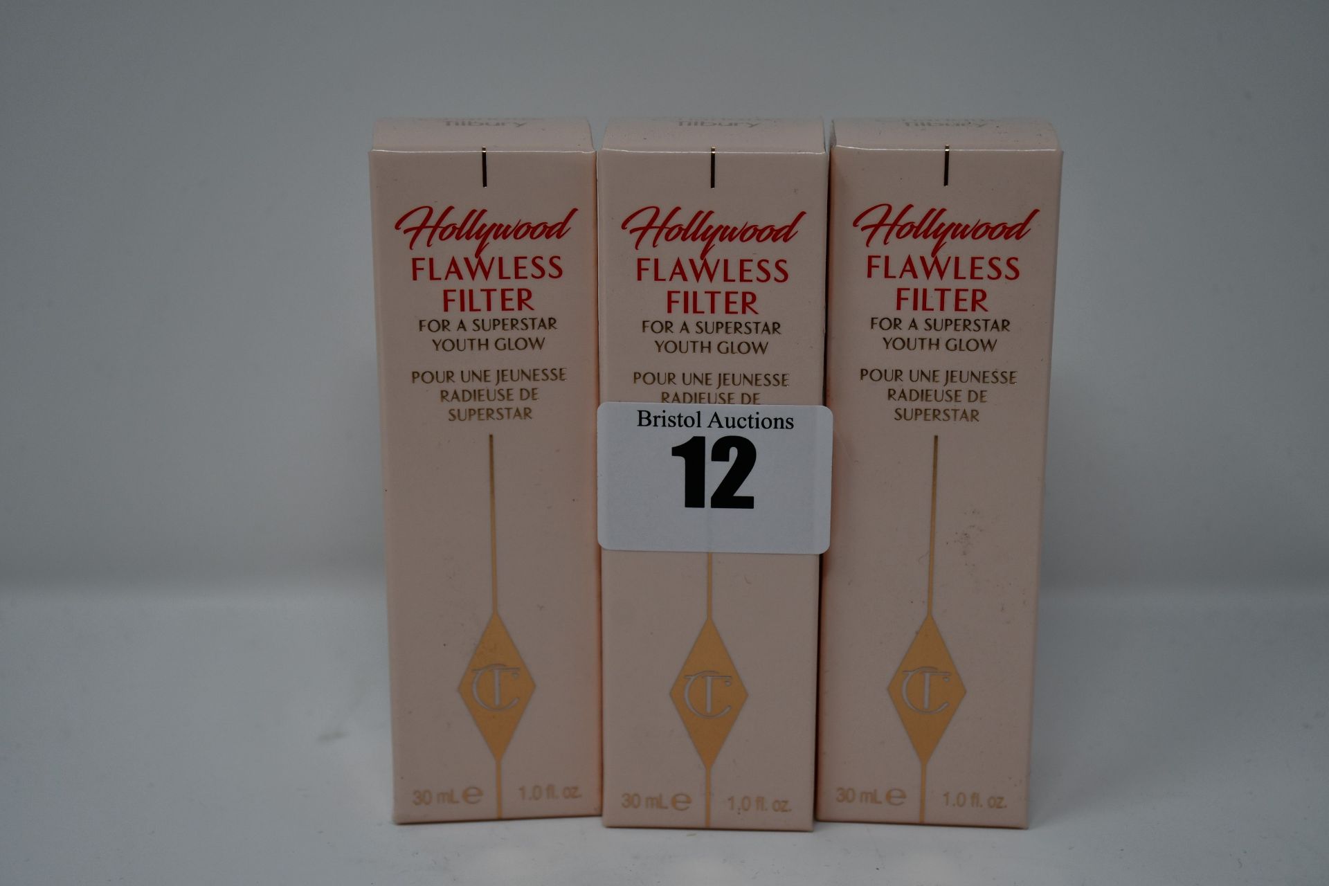 Nine boxed as new Charlotte Tilbury Hollywood Flawless Filter 30ml (For a superstar youth glow).