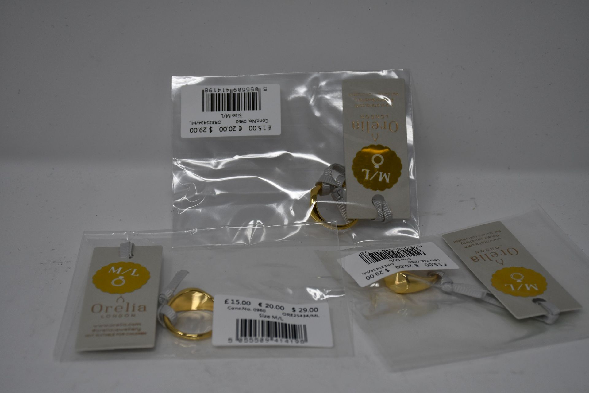 A quantity of Orelia London clean metal oval signet rings M/L (Approximately 50).