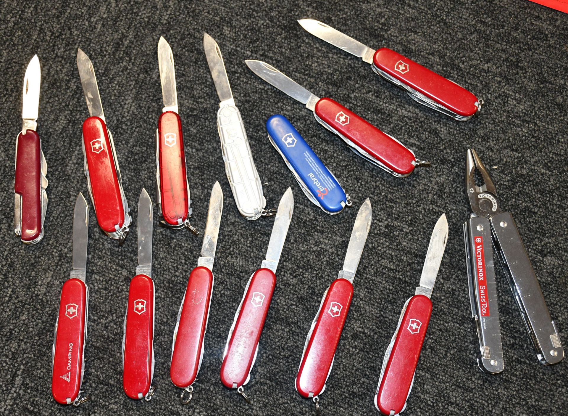 Fourteen assorted Victorinox multitools (Over 18s only). - Image 2 of 2