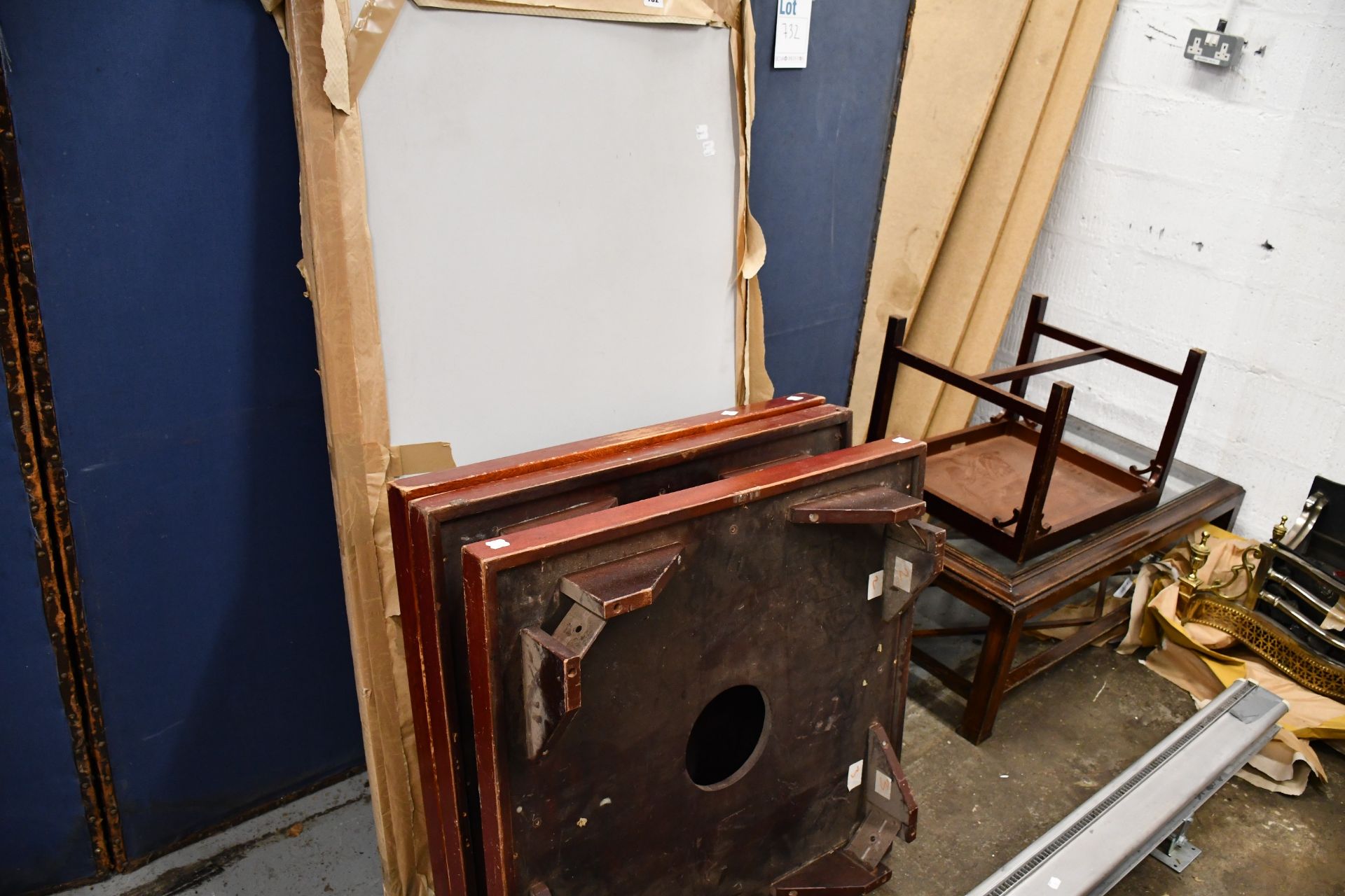 A mahogany glass top coffee table, a folding table, a mahogany coffee table, a round side table