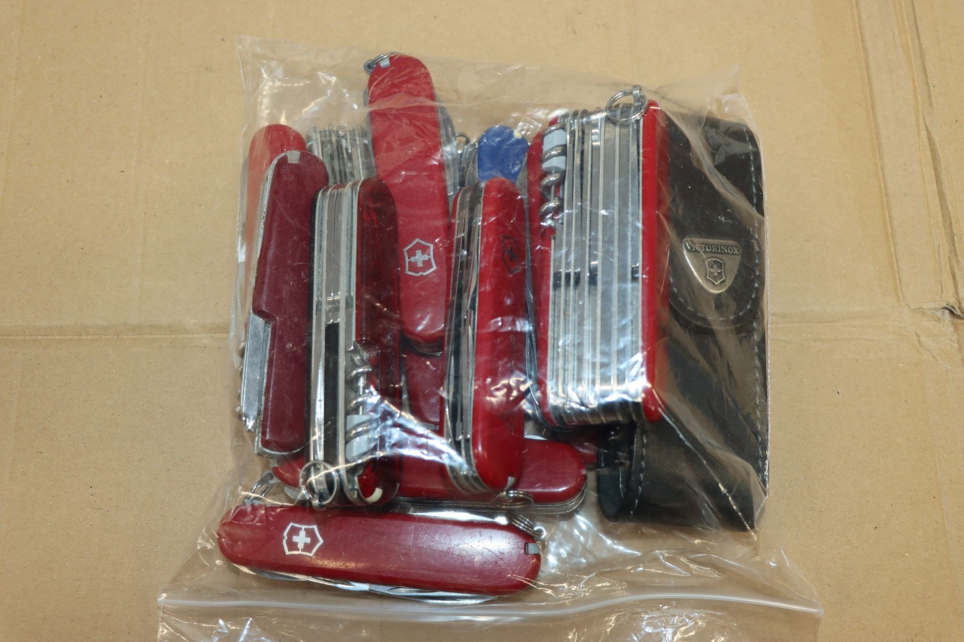 Fourteen assorted Victorinox multitools (Over 18s only).