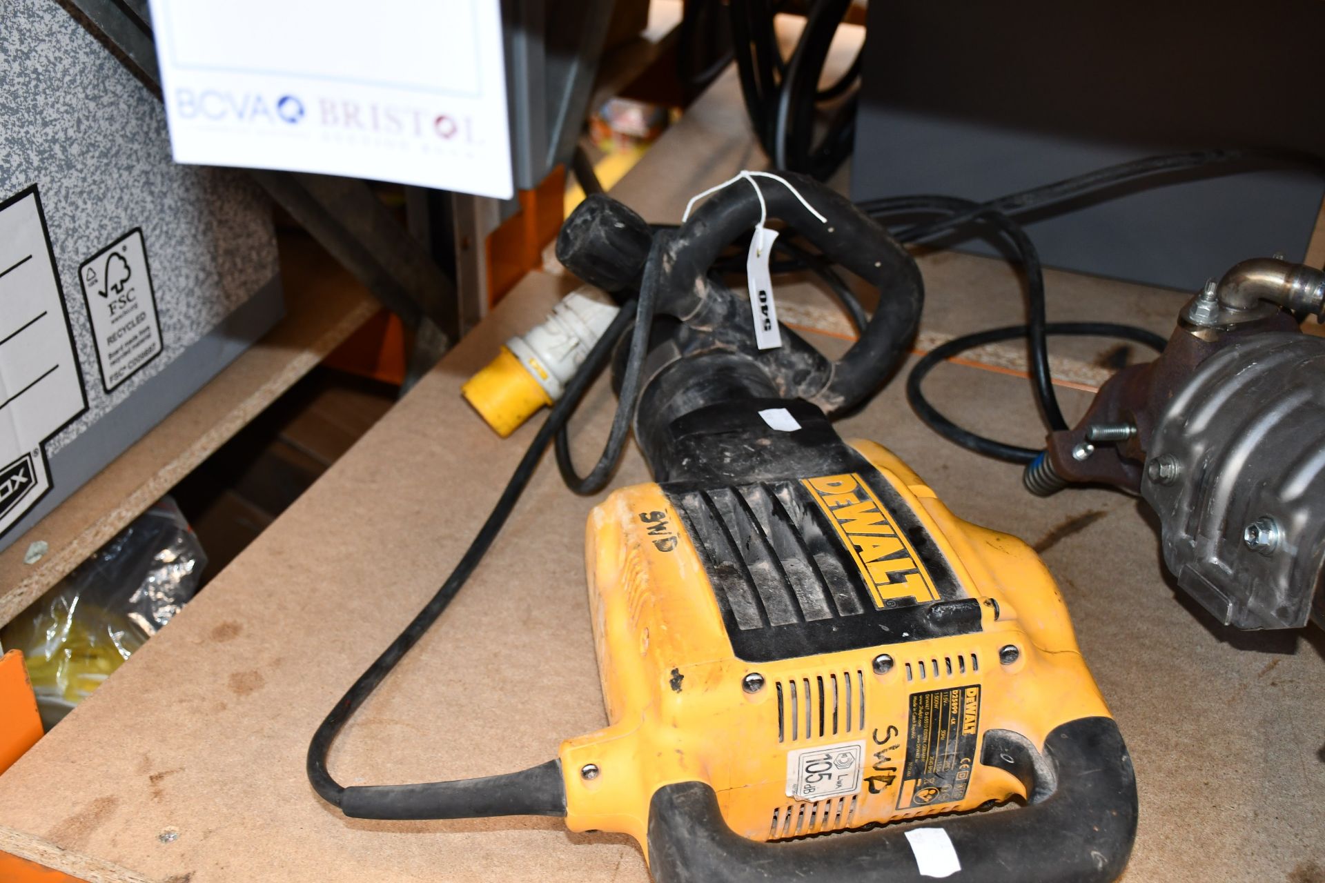 One pre-owned DeWalt demolition hammer.