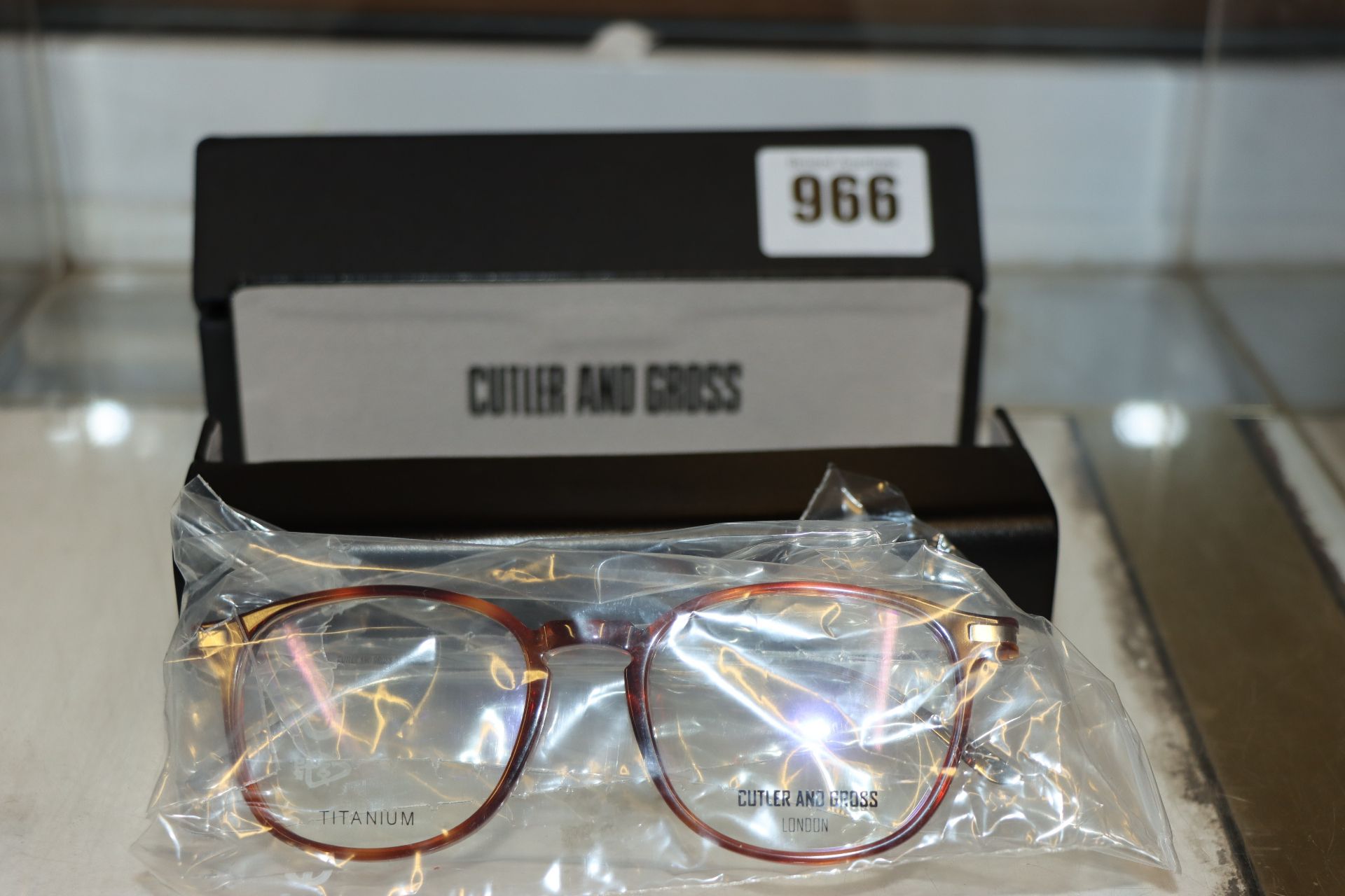 One pair of boxed as new Cutler And Gross titanium glasses frames (Clear glass).