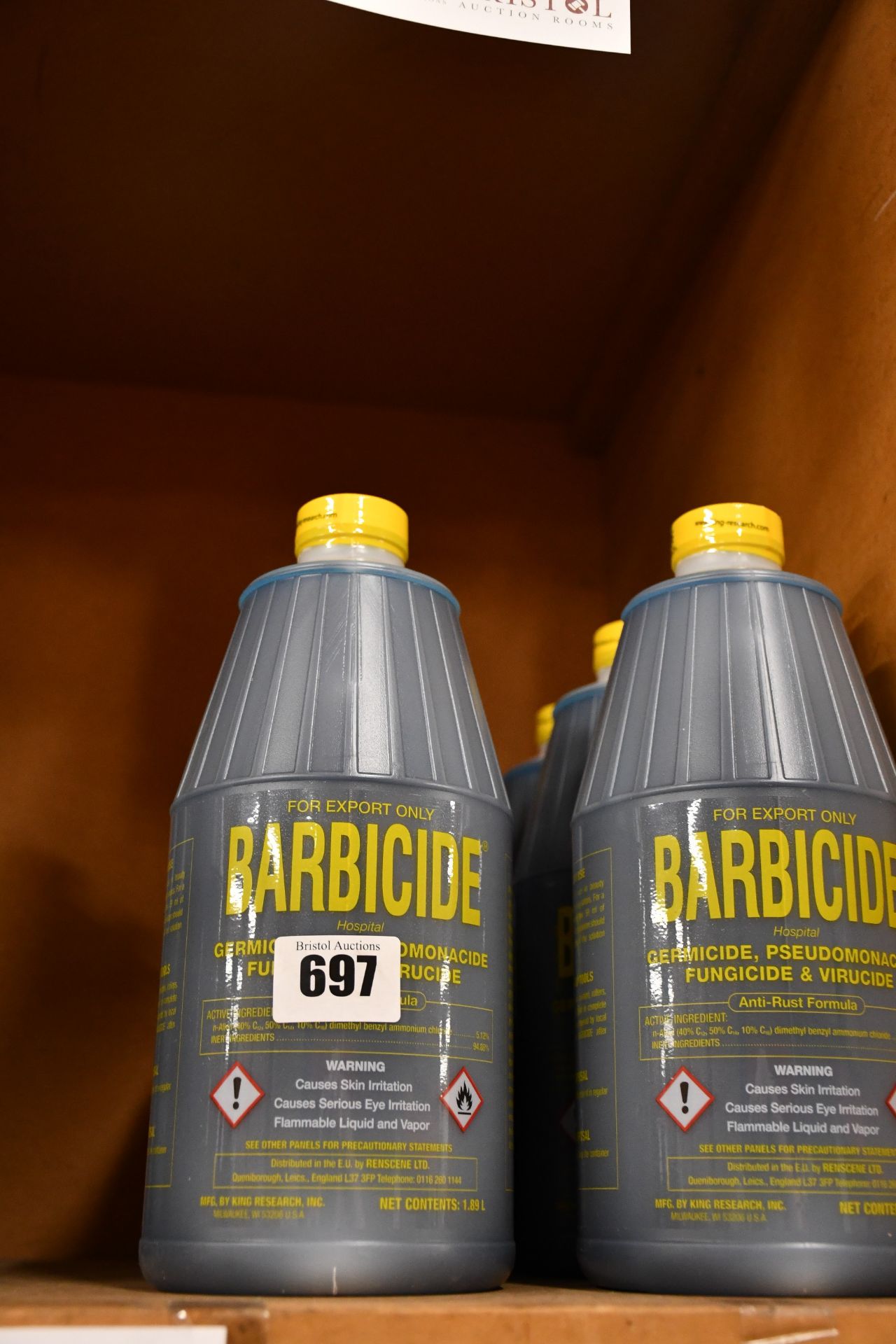 Six bottles of Barbicide solution with anti-rust formation (1.89L).