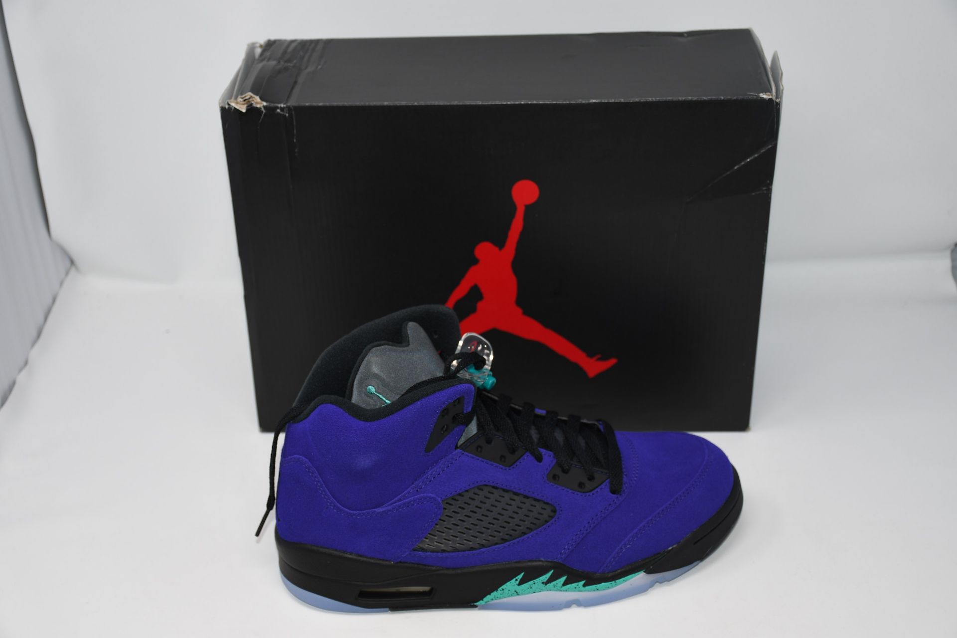 One pair of boxed as new Nike Air Jordan 5 Retro in grape and ice (UK 9).