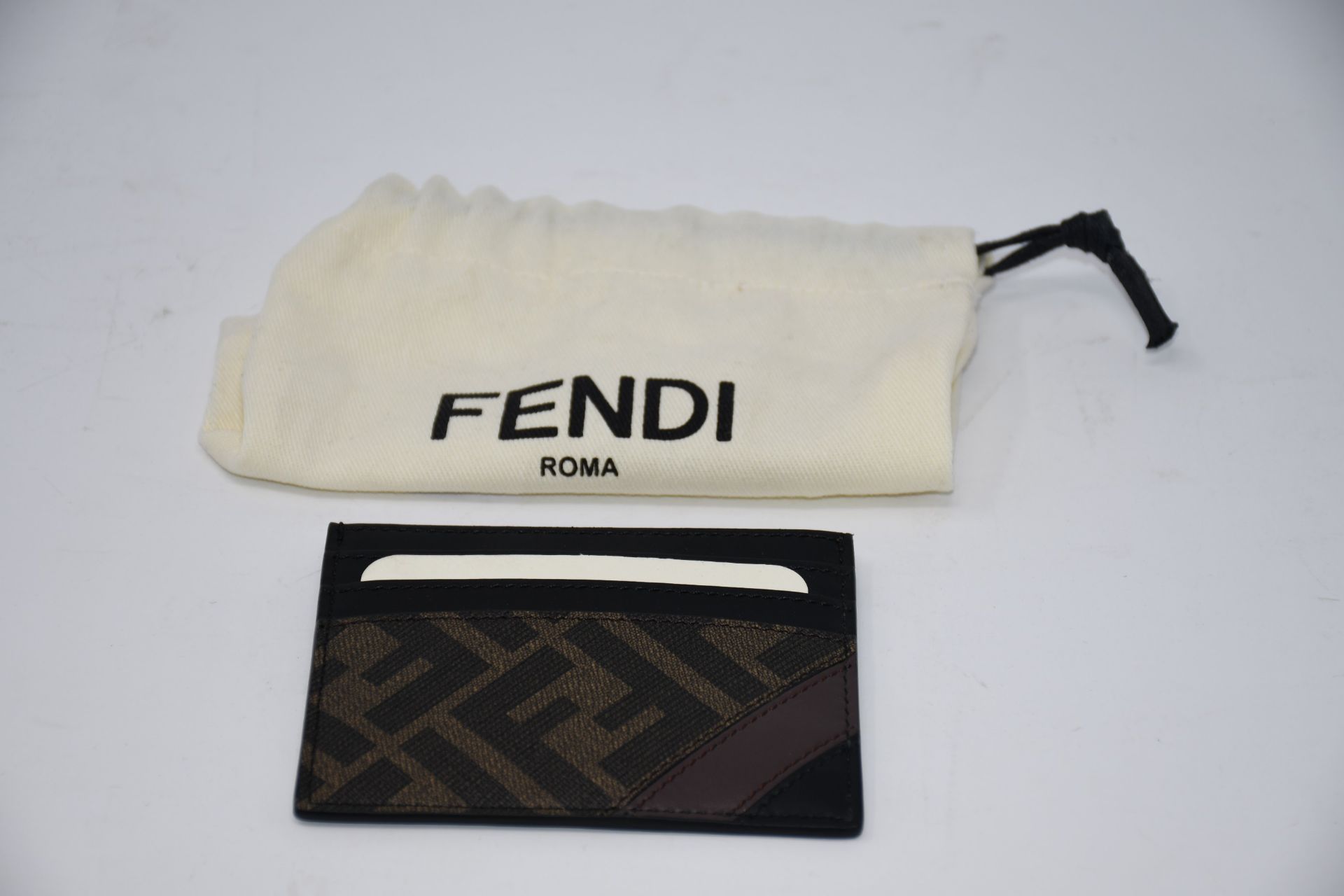 One Fendi FF wallet (Colour: brown).