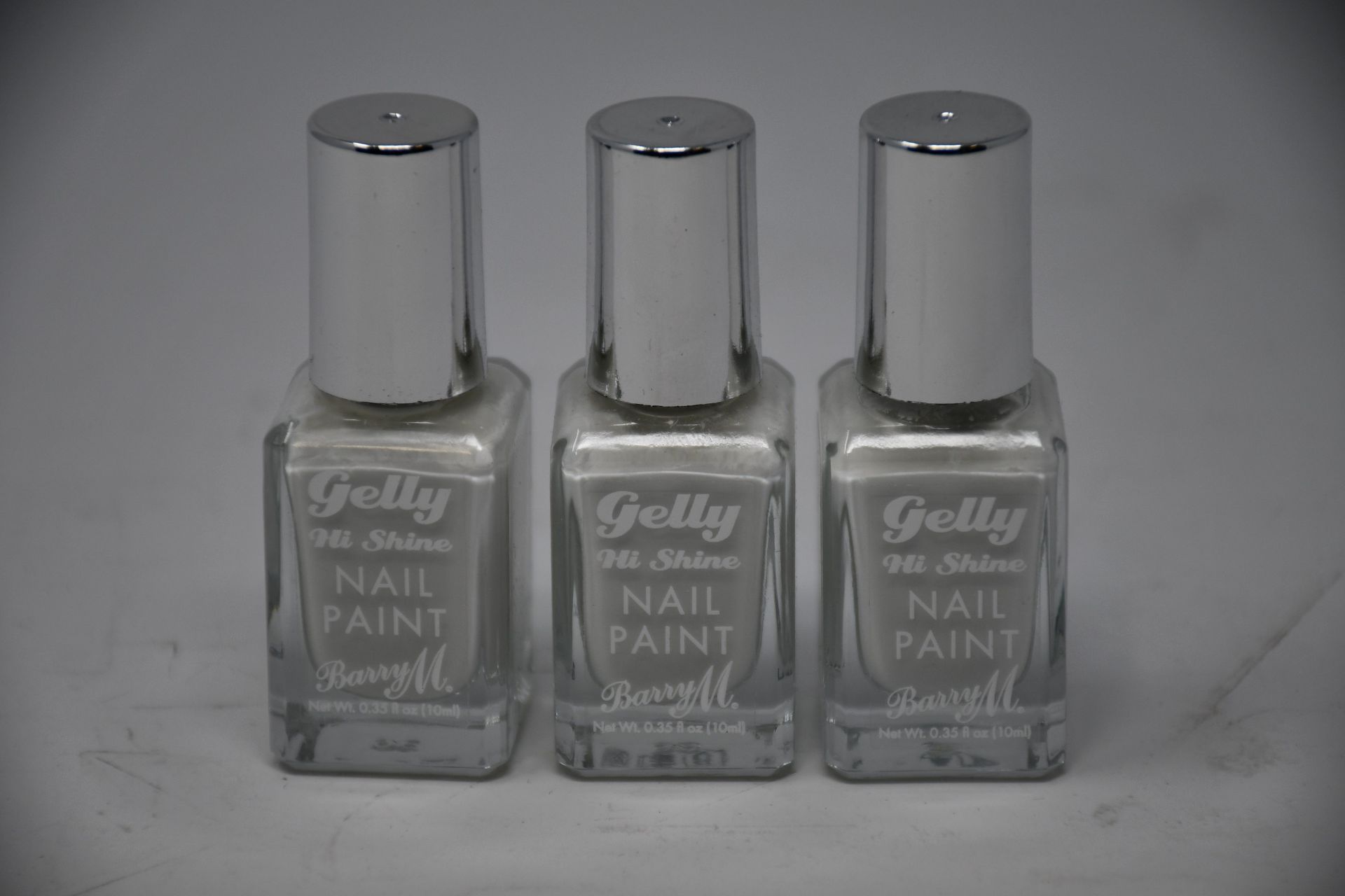 Thirty nine boxes of three Barry M Cosmetics Gelly Hi Shine nail paint in cotton shade (10ml).