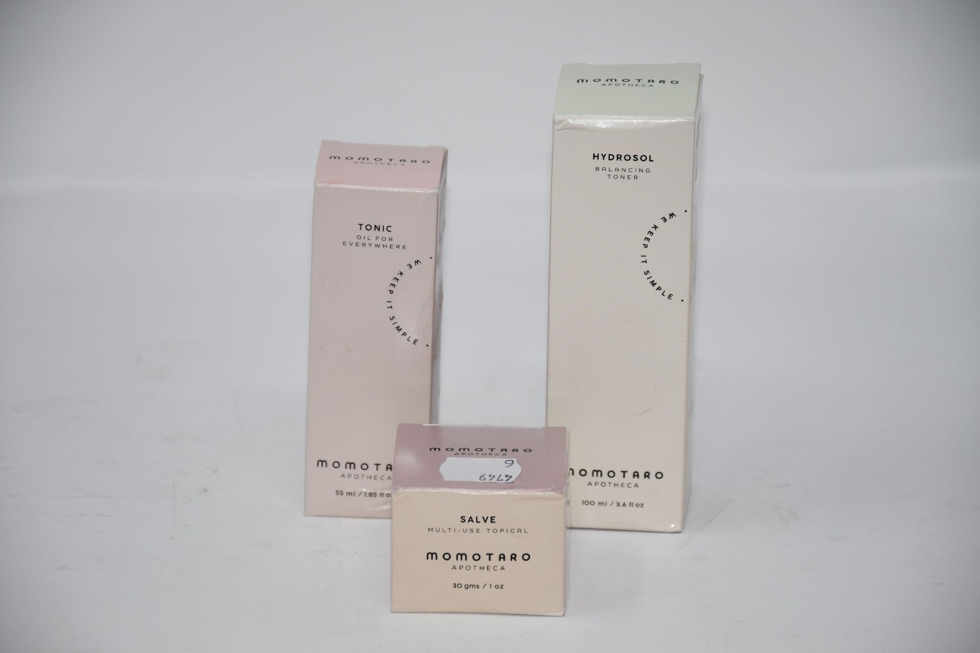 Three boxed Momotoaro Apotheca beauty products to include one Momotaro balancing toner (55ml), one