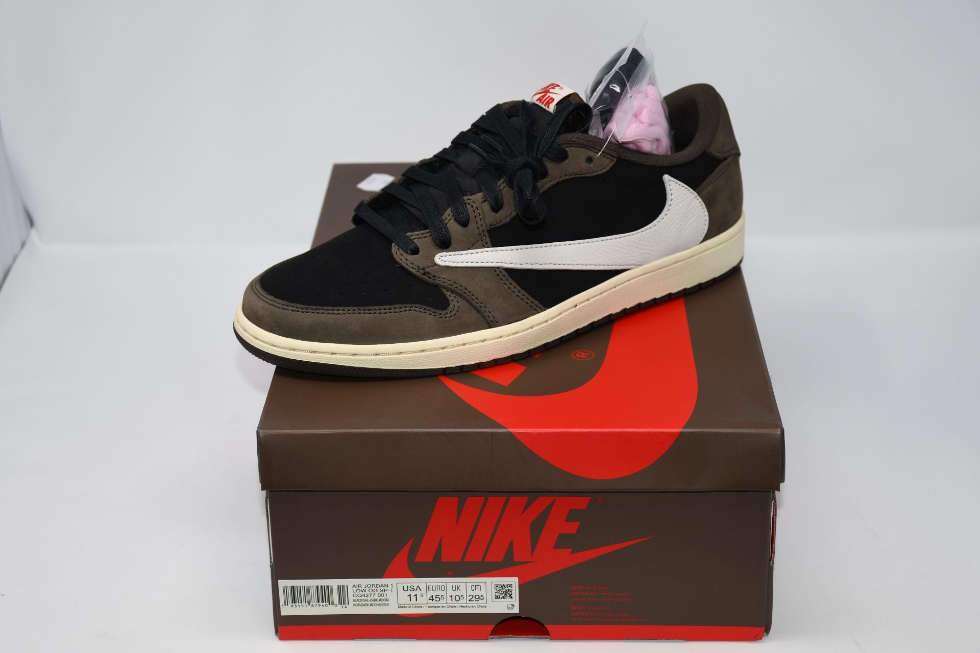 A pair of as new Nike Air Jordan 1 Low OG SP-T Travis Scott trainers (UK 10.5).