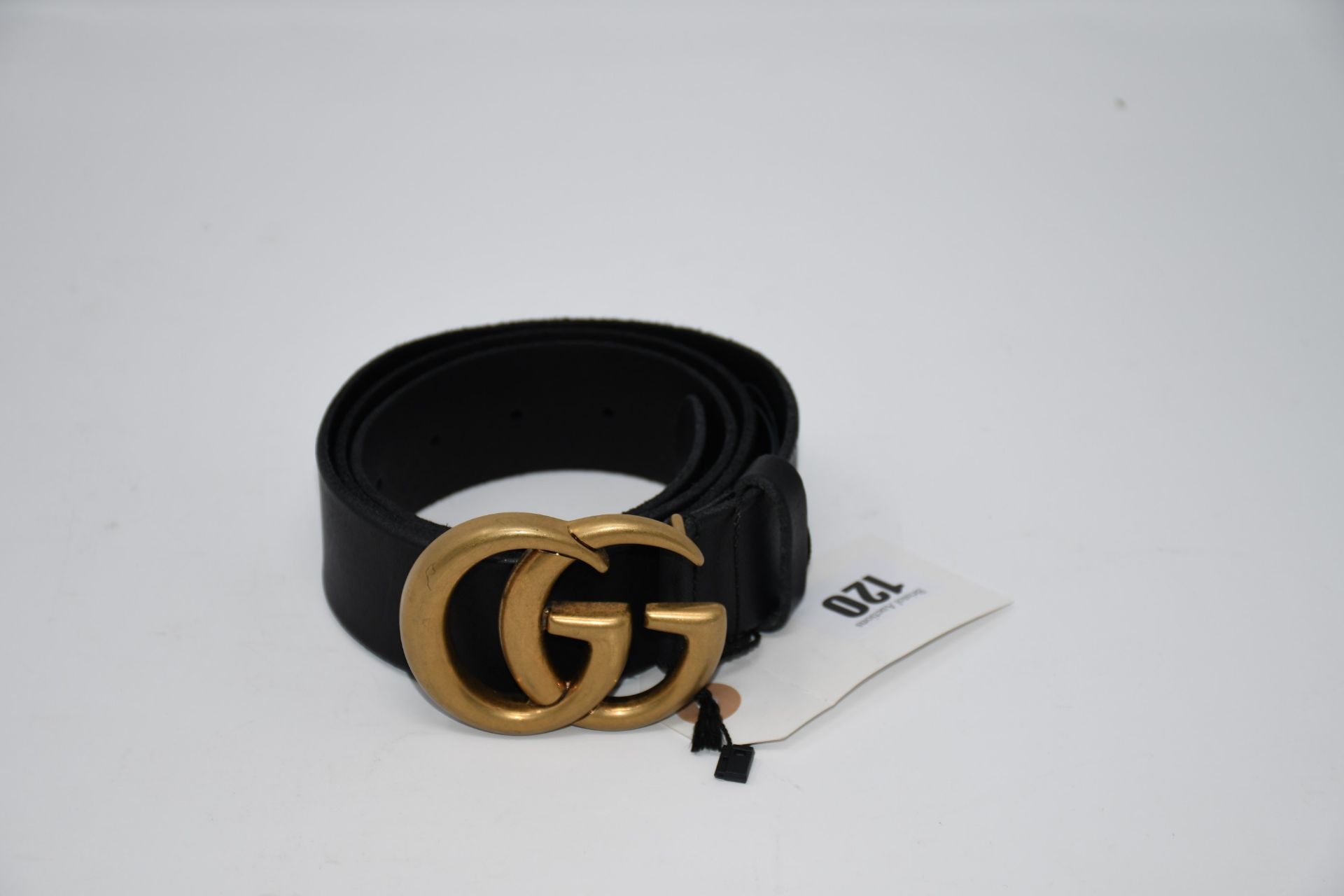 An as new Gucci brown leather belt with GG buckle (M).