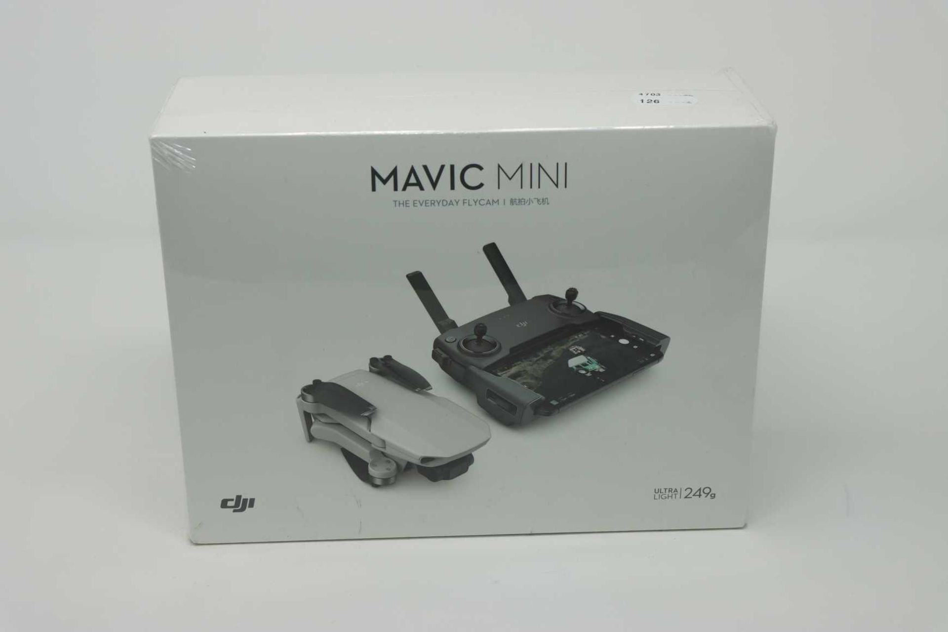 A boxed as new DJI Mavic Mini Ultralight Drone (Model: MT1SD25) (Box sealed).