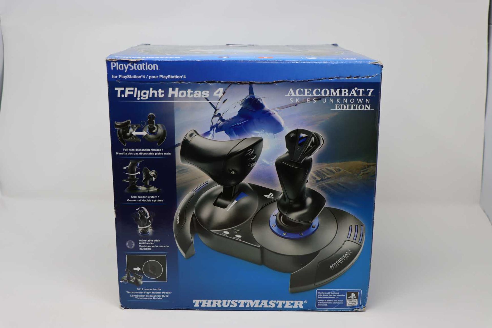 A pre owned boxed Thrustmaster T.Flight Hotas 4 PS4 Joystick - Ace Combat 7 Skies Unknown Edition (