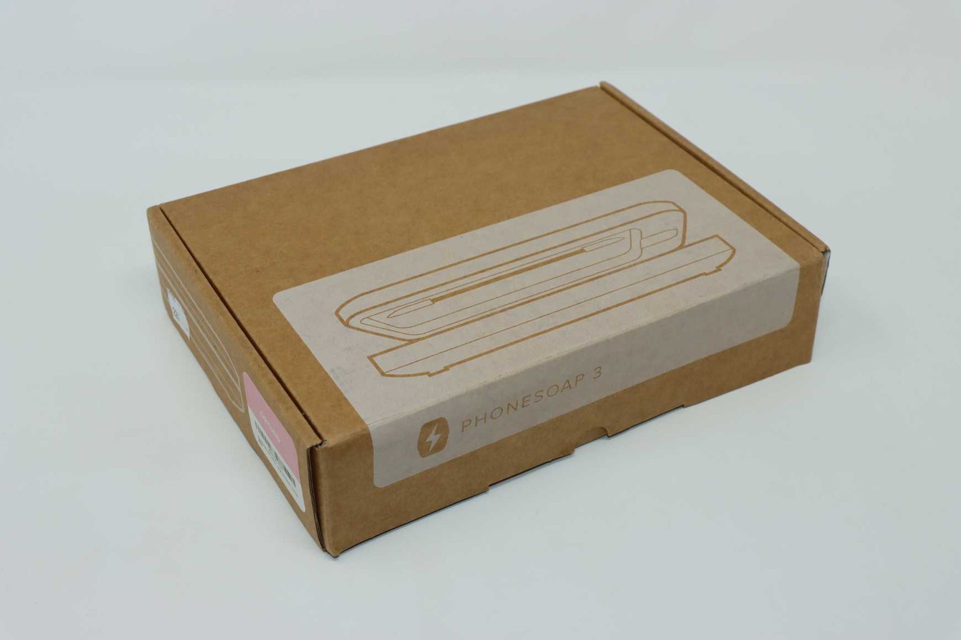 A boxed as new PhoneSoap 3 UV Smartphone Sanitizer & Universal Charger in Orchid (Box opened).