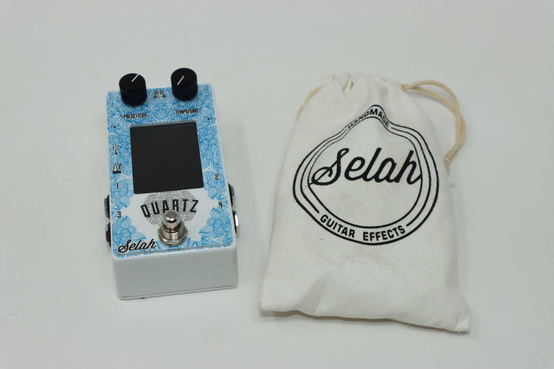 An as new Selah Effects Quartz Timer V2 Guitar Pedal with storage bag.