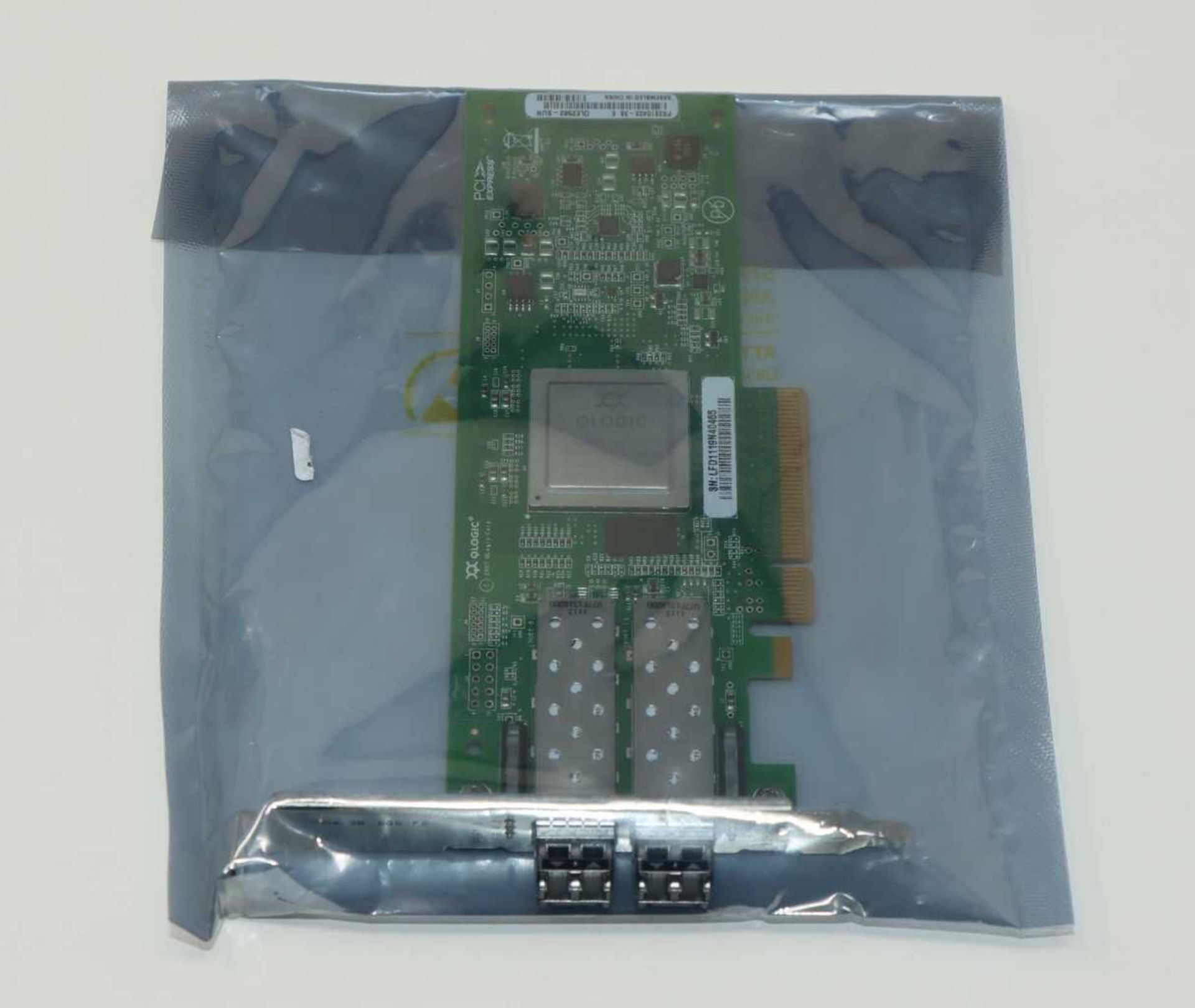 An as new Qlogic QLE2562-SUN Dual Port PCI-E 8GB Fibre Channel Host Bus Adapter (Packaging sealed).