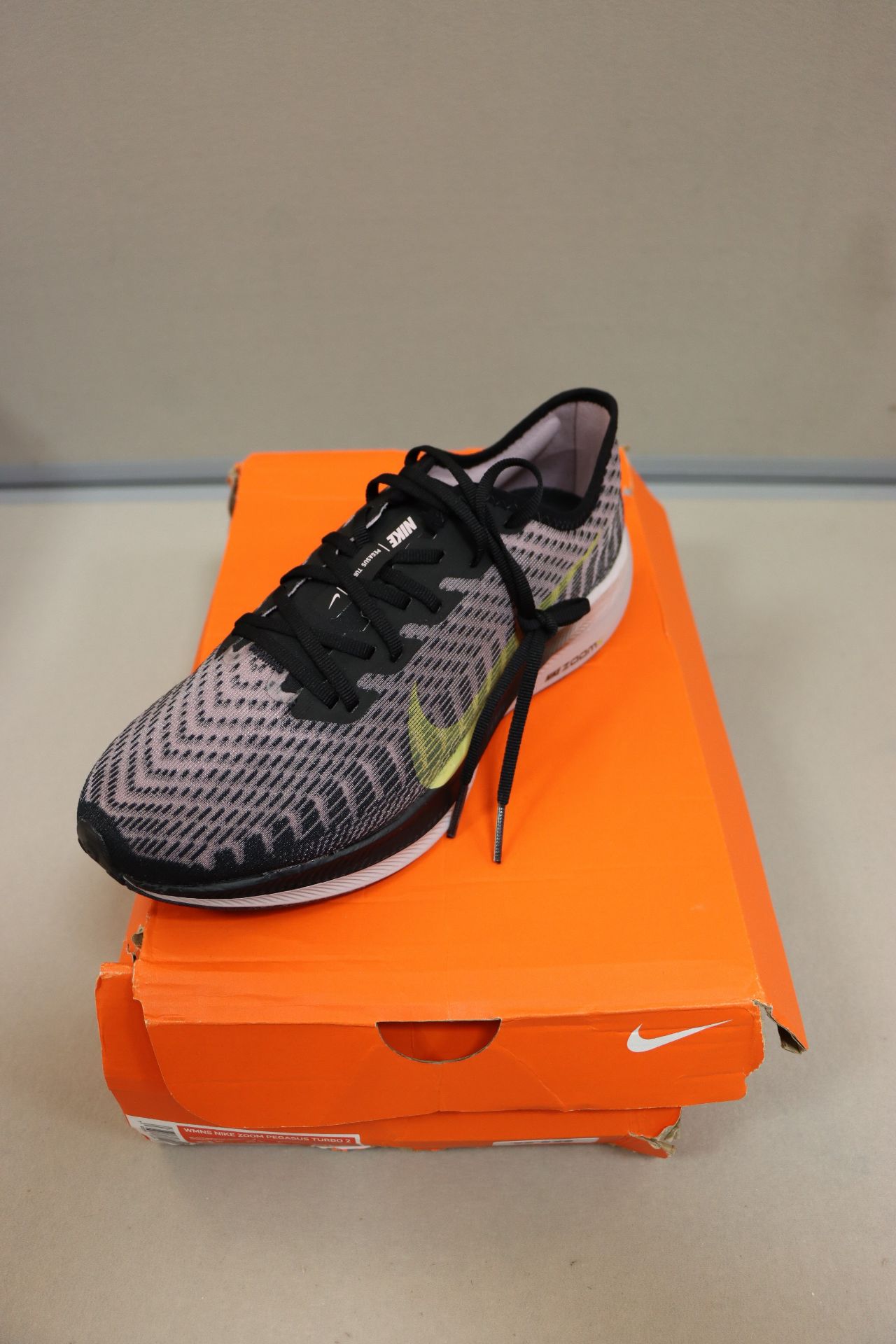 A pair of as new Nike Zoom Pegasus Turbo 2 women's trainers (UK 8) (Damage to box).
