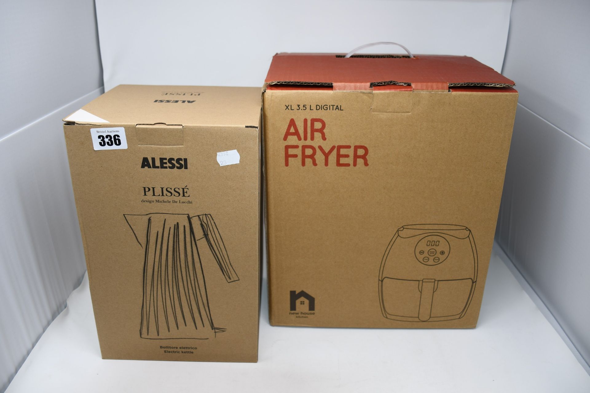 One Alessi Plisse electric kettle in white and one New House Kitchen Air Fryer XL (3.5ltr digital).