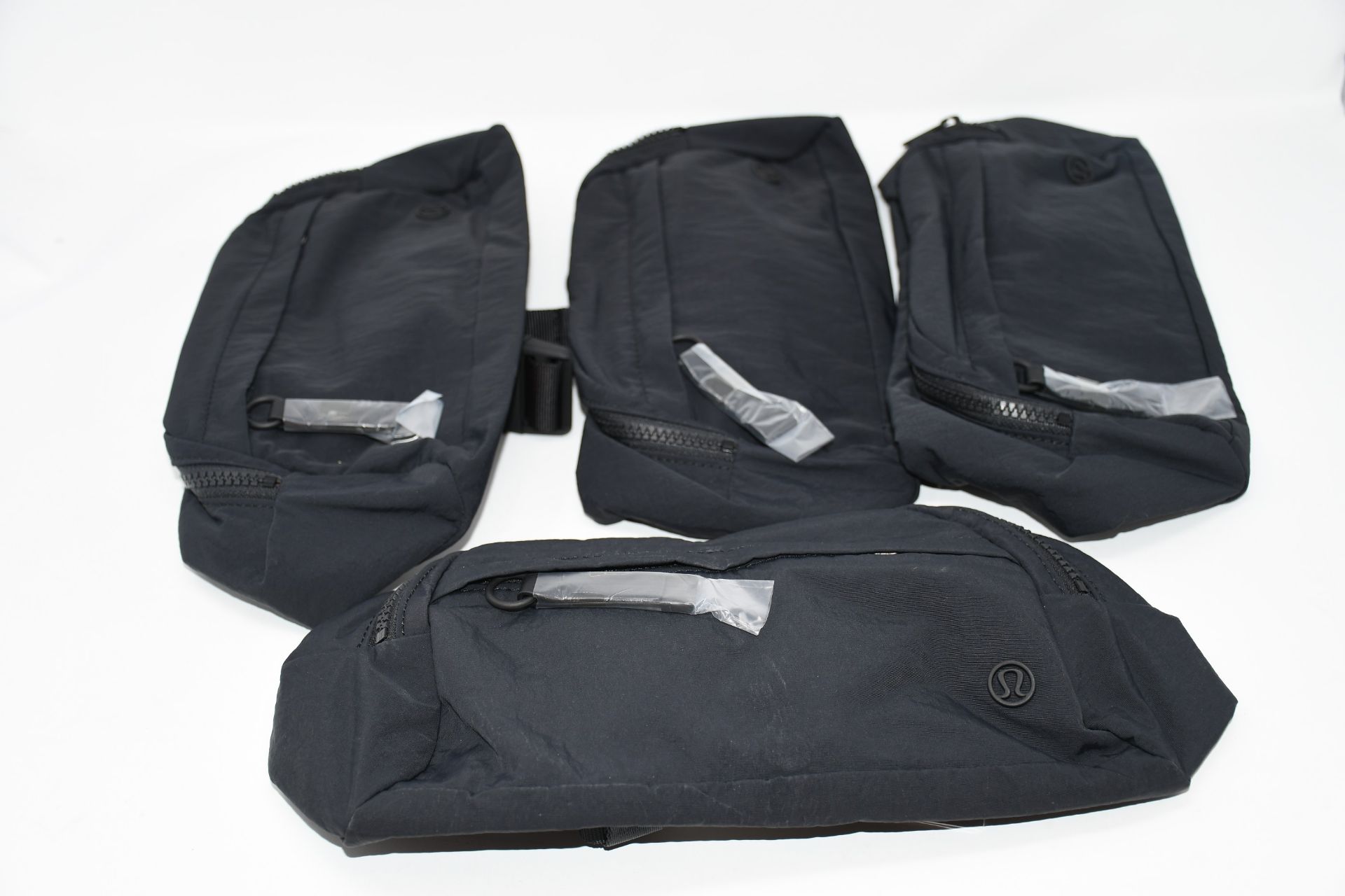 Four as new Lululemon On the Beat Black Belt Bag (LW9BORS).