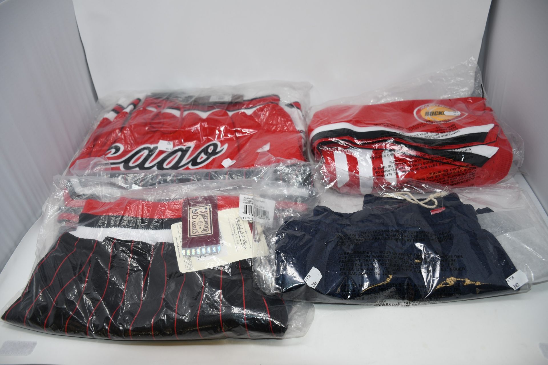 One as new Mitchell and Ness Short bulls shorts size XXL (SHORNG13322). One as new Mitchell and Ness