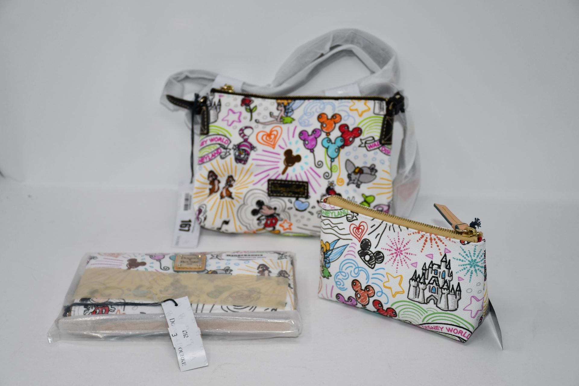 An as new Dooney & Bourke wallet from the Disney collection, An as new Dooney & Bourke cosmetics bag