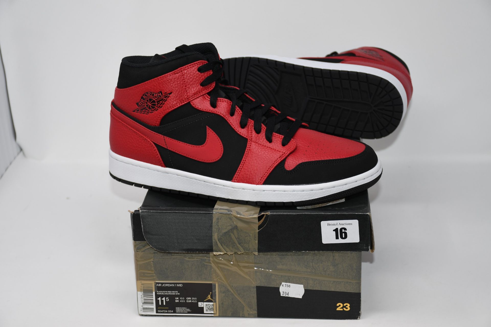 One pair of as new Air Jordan 1 Mid black/gym red-white size 10.5.