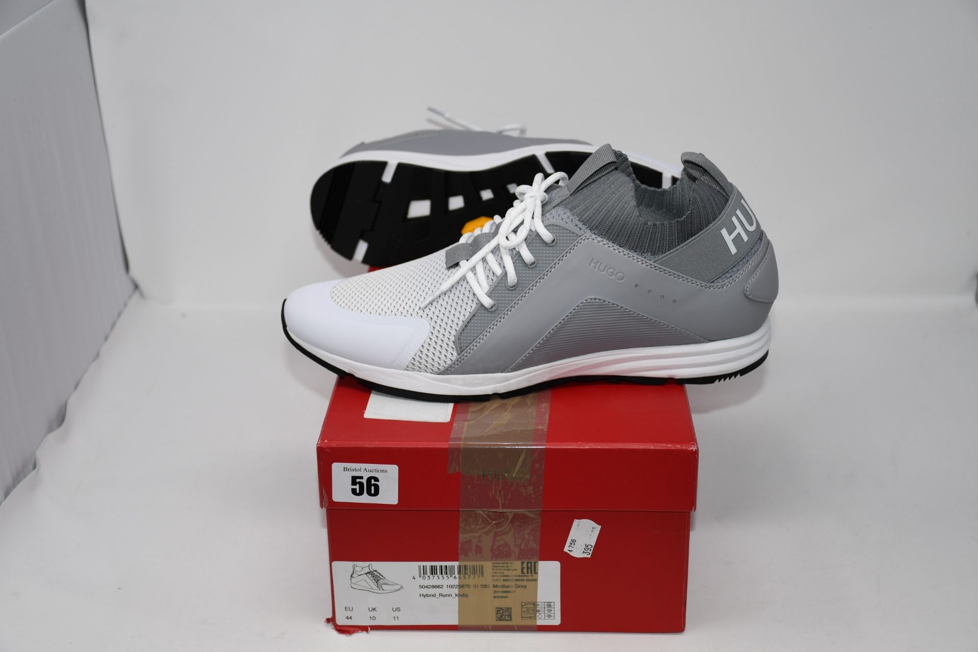One pair of as new Hugo Boss Logo trainers with hybrid uppers and knitted sock size UK 10.