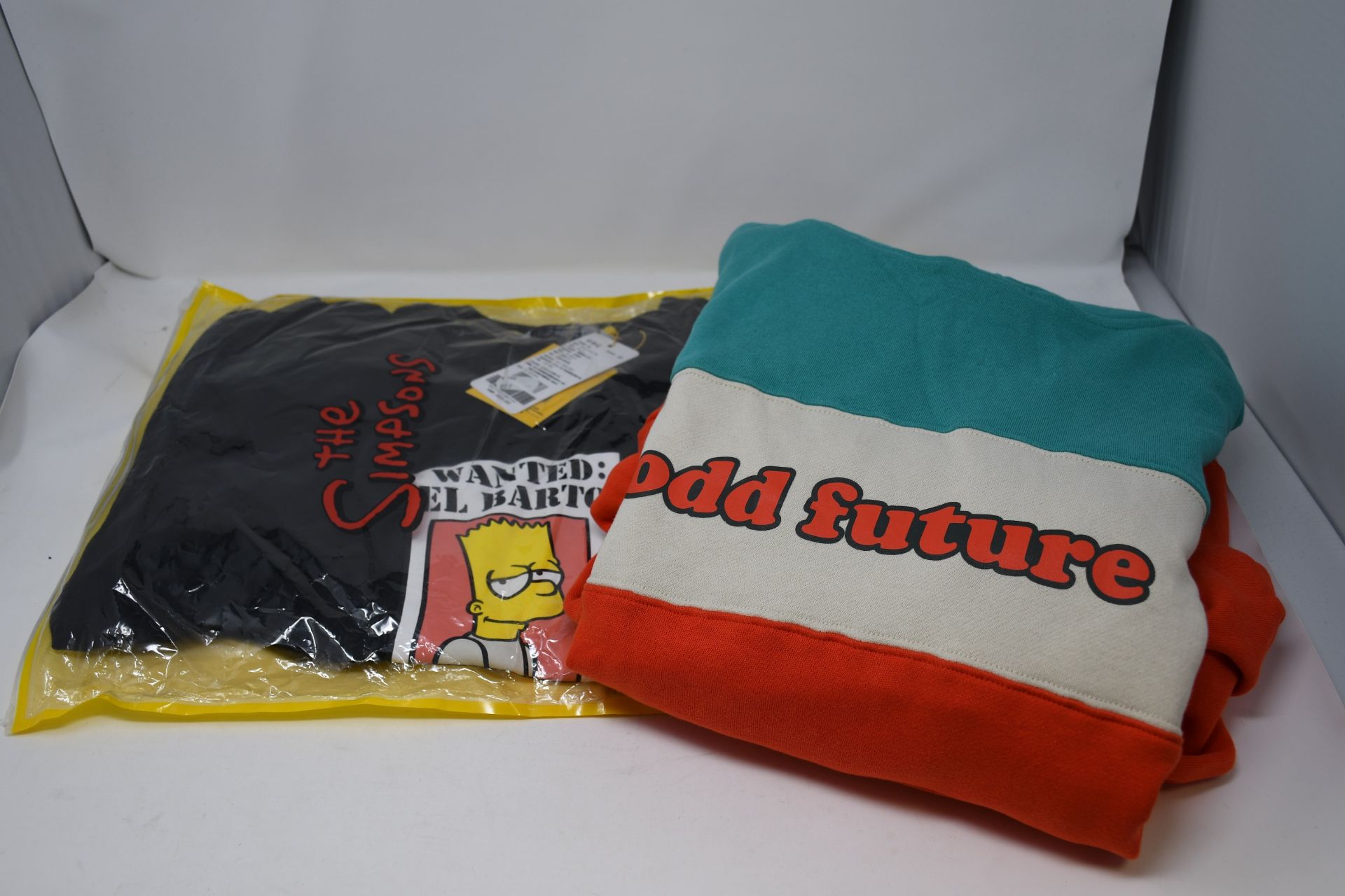 One as new Odd Future Teal, & Orange Colorblock Hoodie size L. One as new Wanted El Barto Simpsons