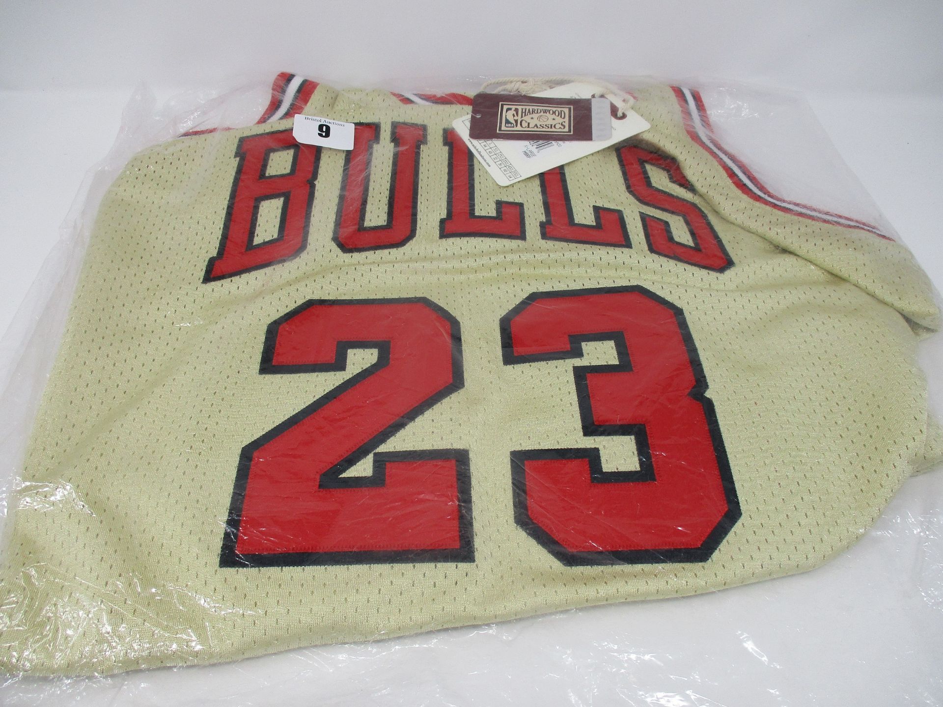 One as new Mitchell & Ness Michael Jordan 1995 Gold Authentic Jersey Chicago Bulls size XL (