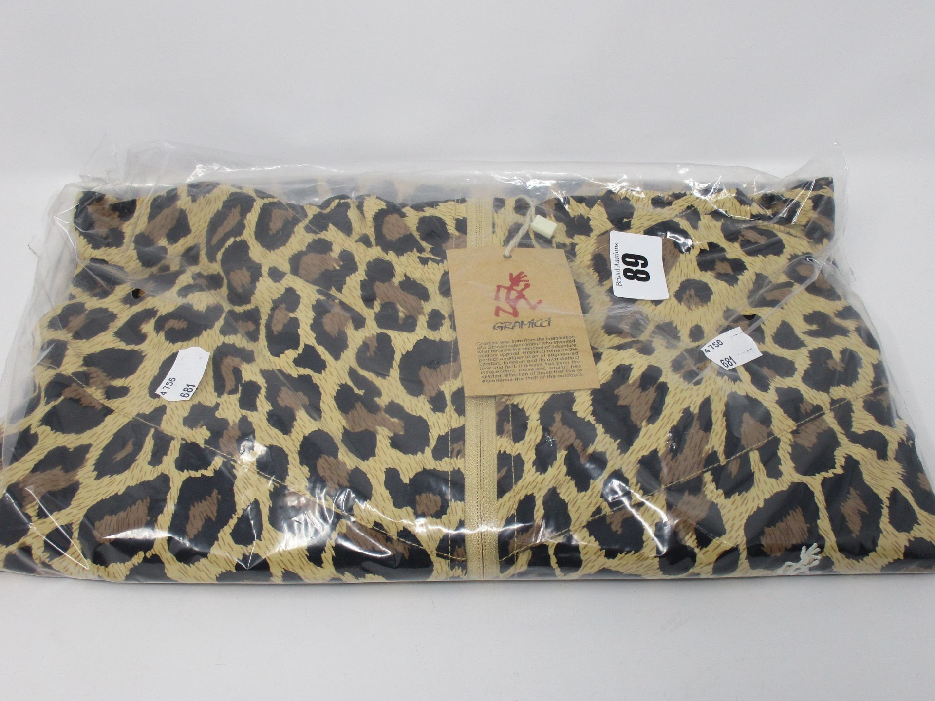 One as new Gramicci shell leopard jacket size XL.