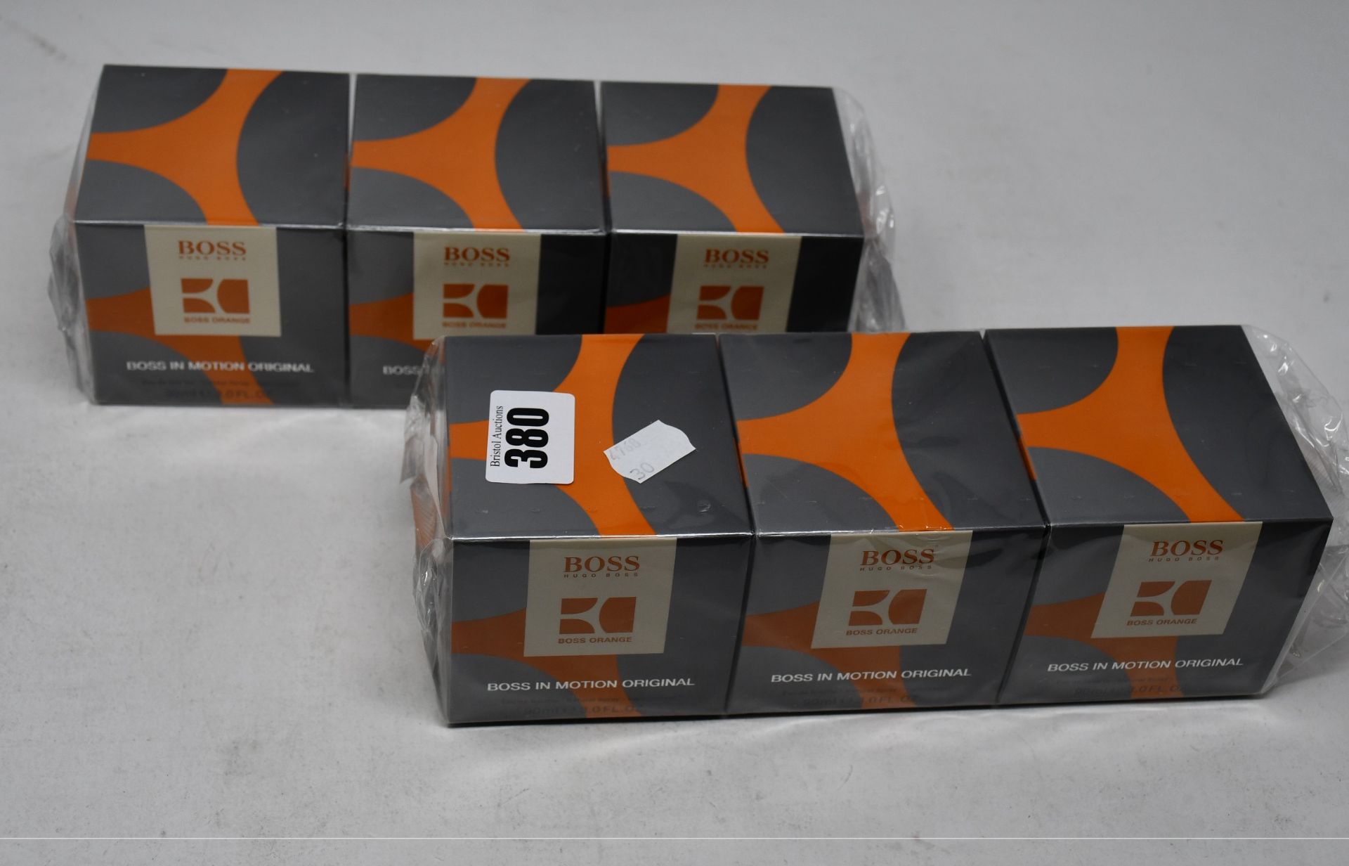 Six boxed as new Hugo Boss Boss Orange Boss In Motion eau de toilette (90ml).