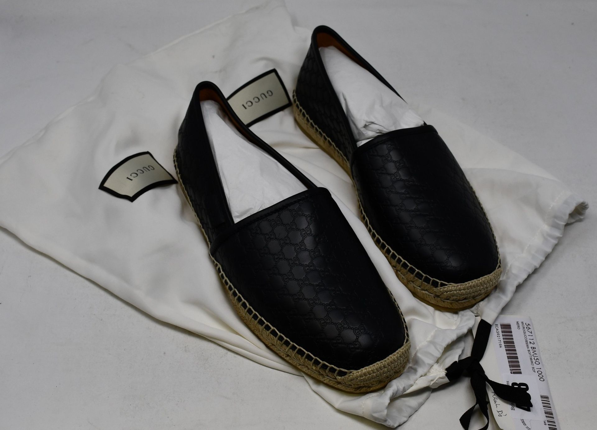 One women's as new Gucci Microguccissima black leather espadrille size 7+.
