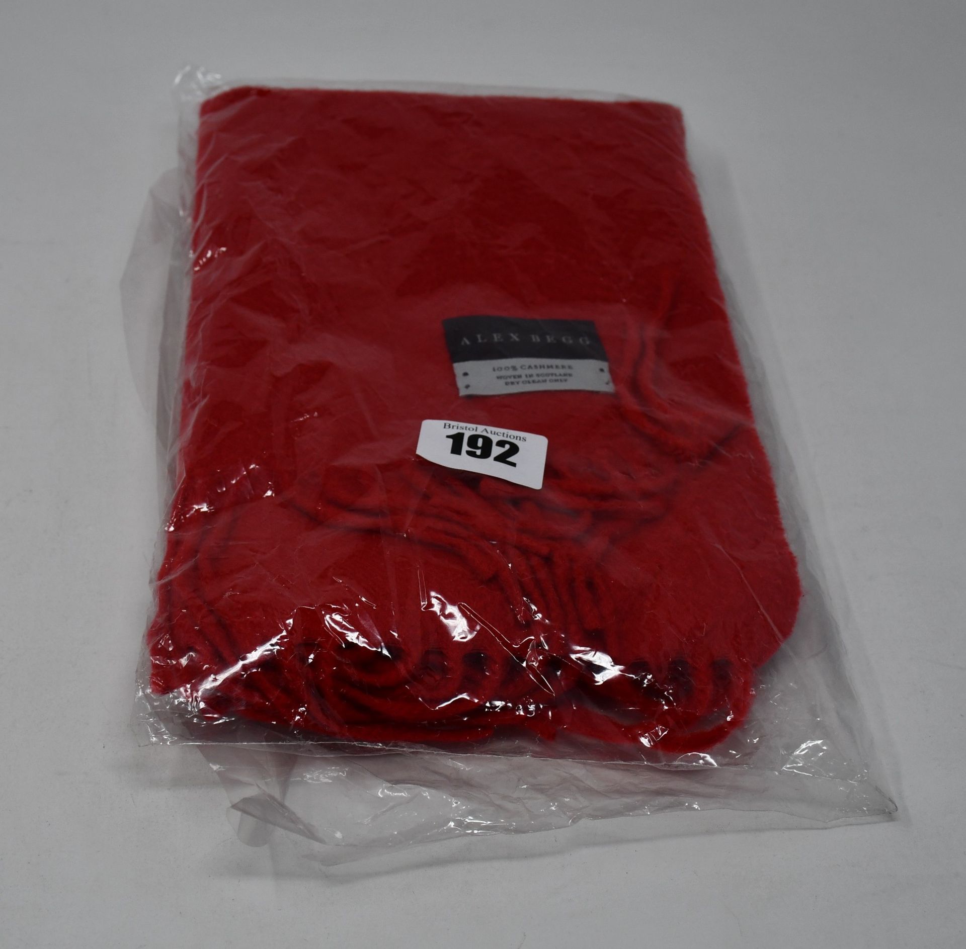 One as new Alex Begg red cashmere scarf.