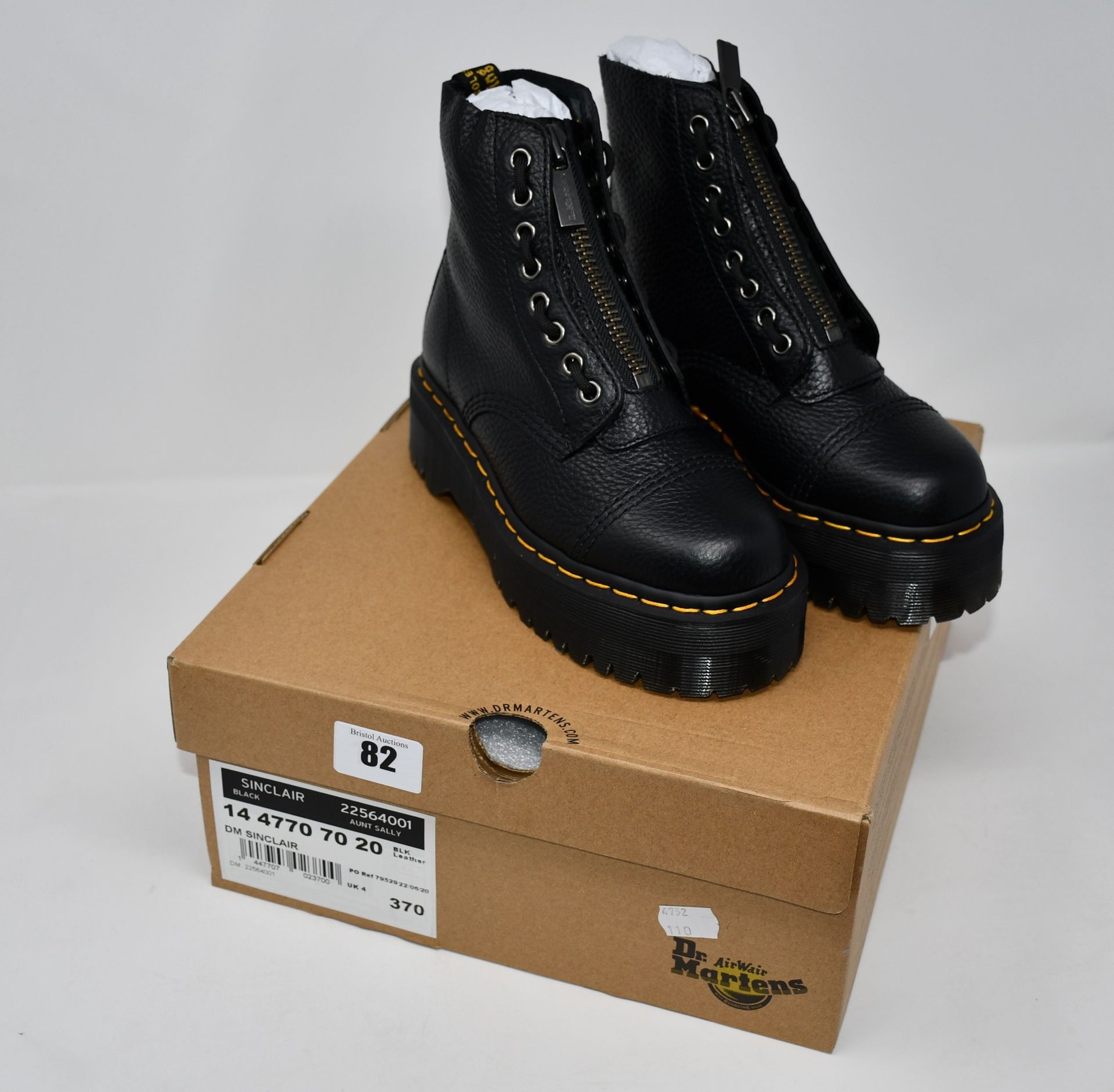 One pair of lady's boxed as new Dr. Marten's Sinclair platform boots in black (UK 4).