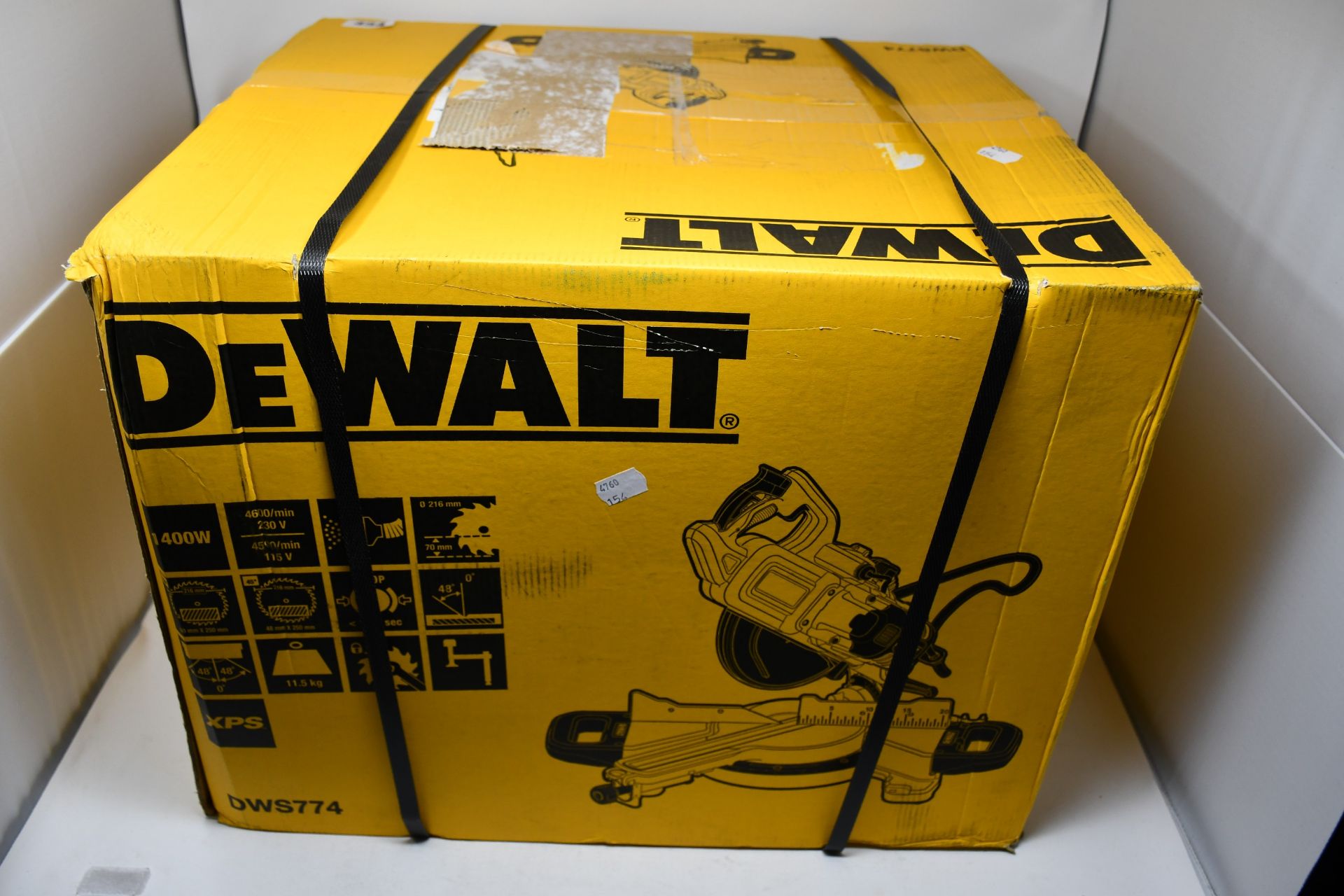 One boxed as new Dewalt 240v slide mitre saw with XPS (Shipping is not available on this Lot,